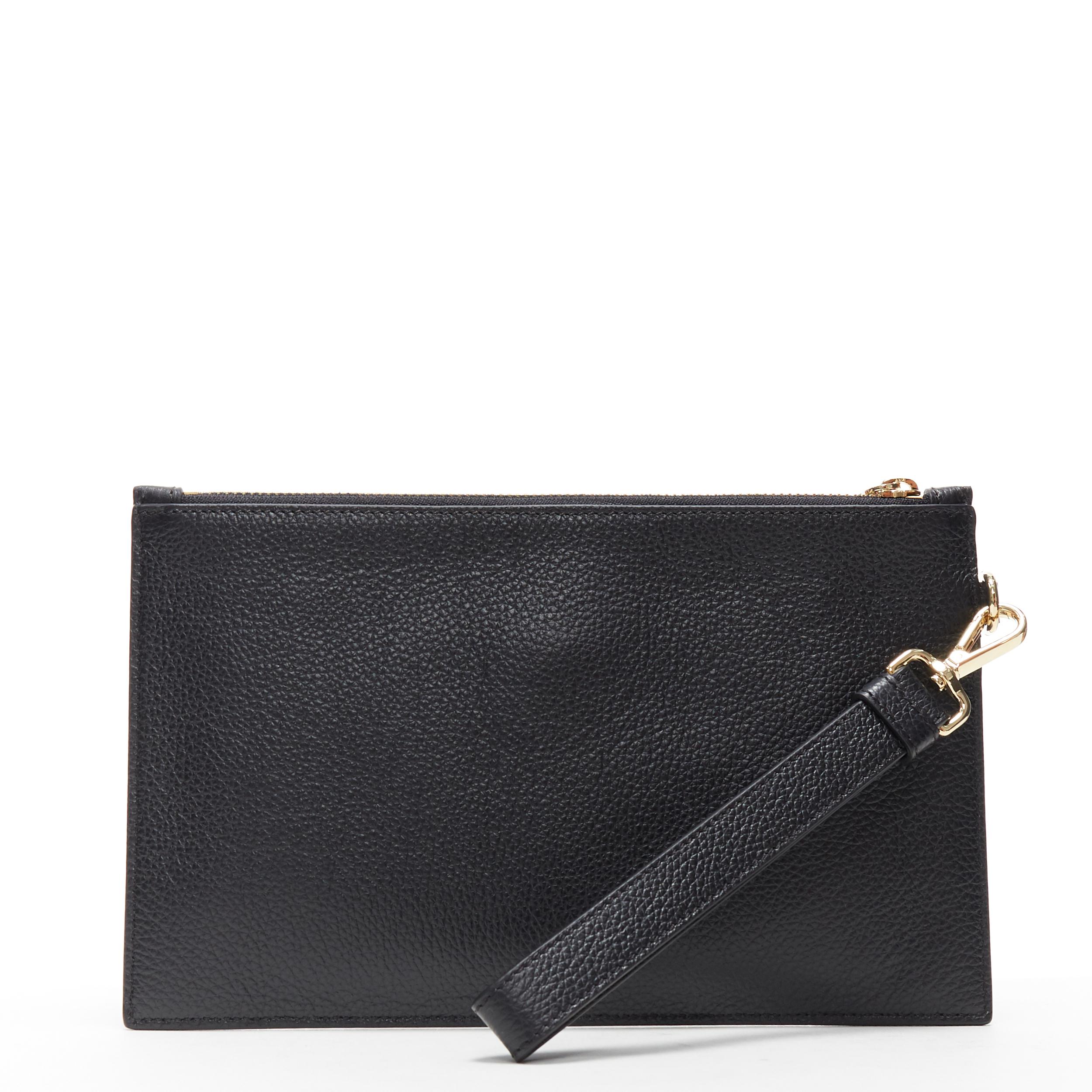 black leather wristlet clutch bag