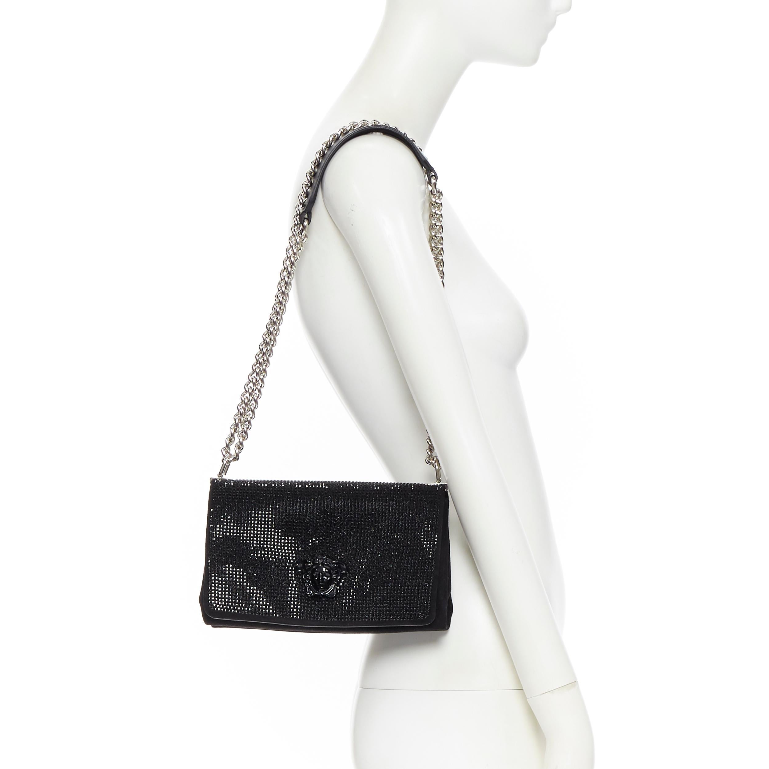 new VERSACE Palazzo Medusa black strass crystal flap chunky chain shoulder bag 
Brand: Versace
Designer: Donatella Versace
Model Name / Style: Palazzo Medusa
Material: Suede
Color: Black
Pattern: Solid
Closure: Magnetic
Extra Detail: Suede leather