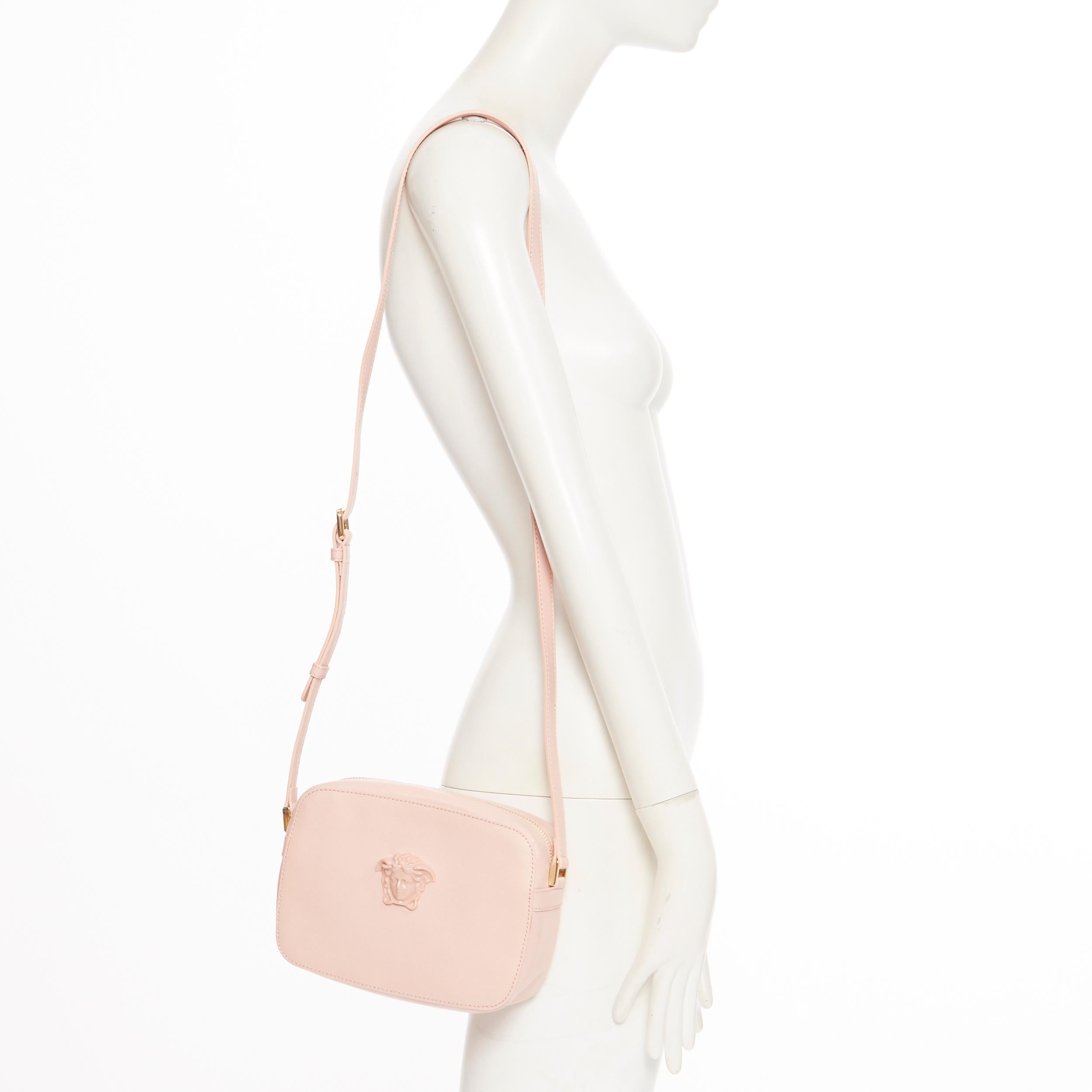 new VERSACE Palazzo Medusa head blush pink saffiano leather crossbody camera bag
Brand: Versace
Designer: Donatella Versace
Model Name / Style: Palazzzo camera bag
Material: Leather; saffiano leather
Color: Pink; beige nude pink
Pattern: