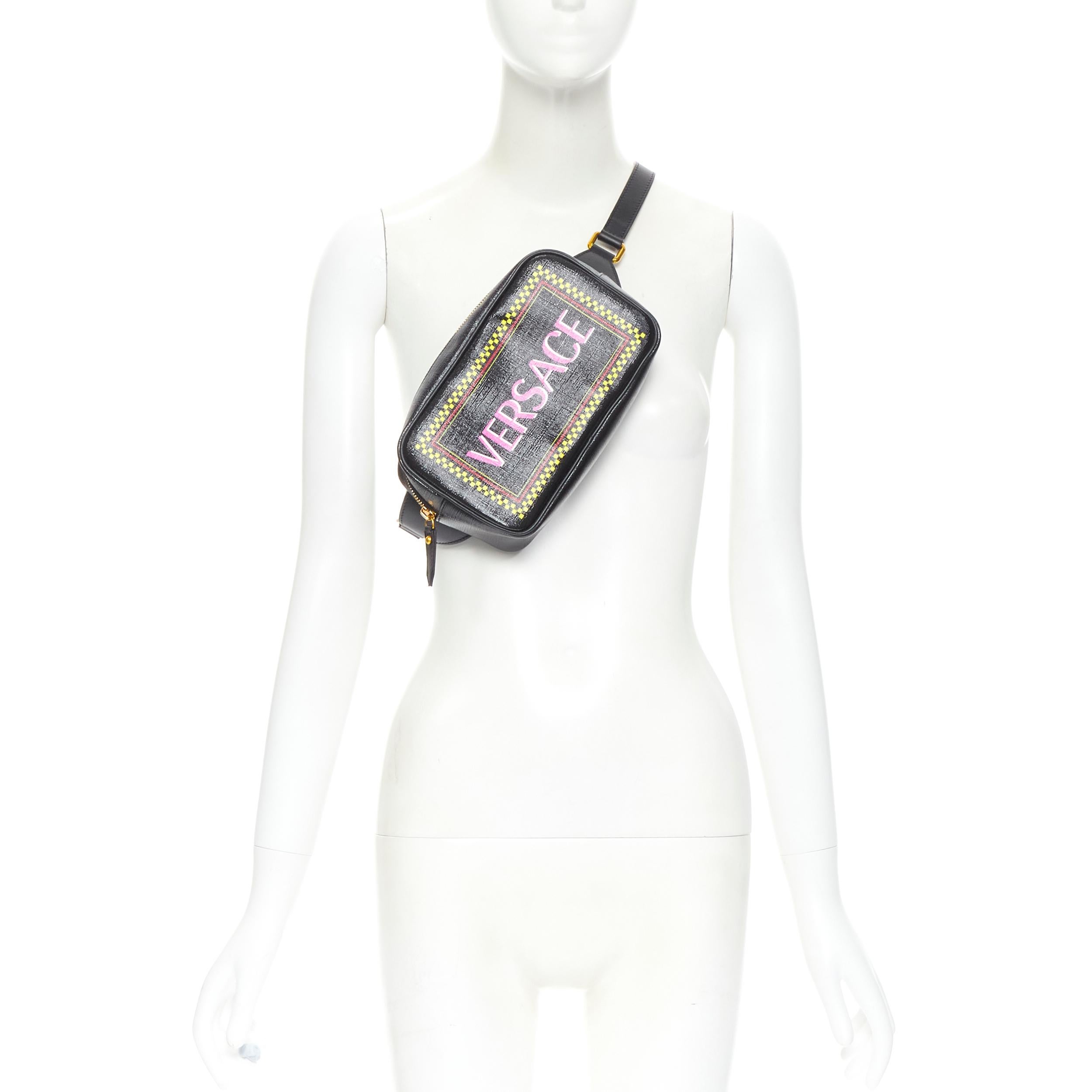 new VERSACE pink 90's logo black glossy saffiano leather crossbody belt bag 
Reference: TGAS/B01499 
Brand: Versace 
Designer: Donatella 
Versace Model: 90's logo belt bag 
Material: Leather 
Color: Black 
Pattern: Solid 
Closure: Zip 
Extra Detail: