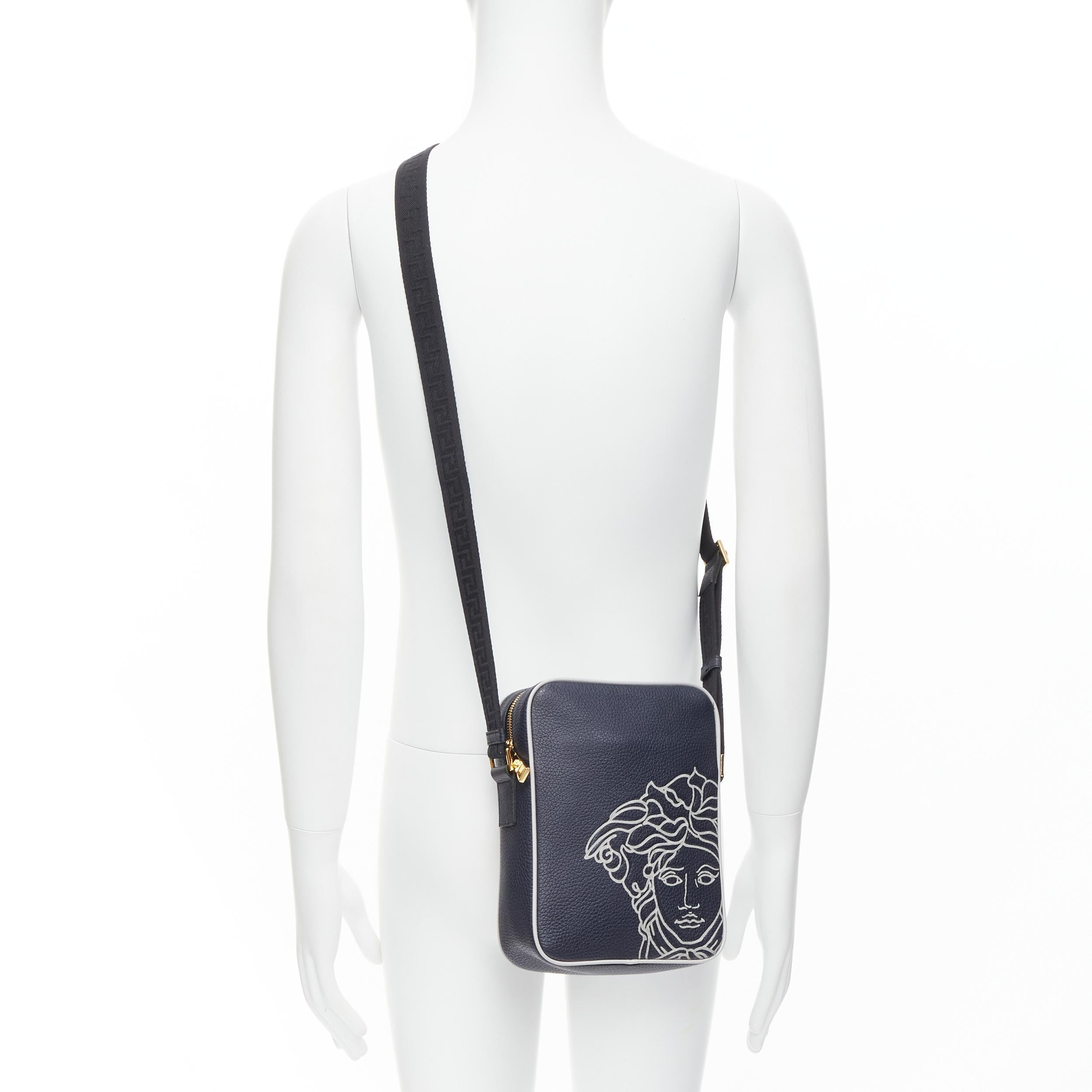 new VERSACE Pop Medusa navy grey calf leather Greca nylon crossbody bag 
Reference: TGAS/C00053 
Brand: Versace 
Designer: Donatella Versace 
Model: DL28085 DVTG4M K044H 
Collection: Pop Medusa 
Material: Leather 
Color: Navy 
Pattern: Solid