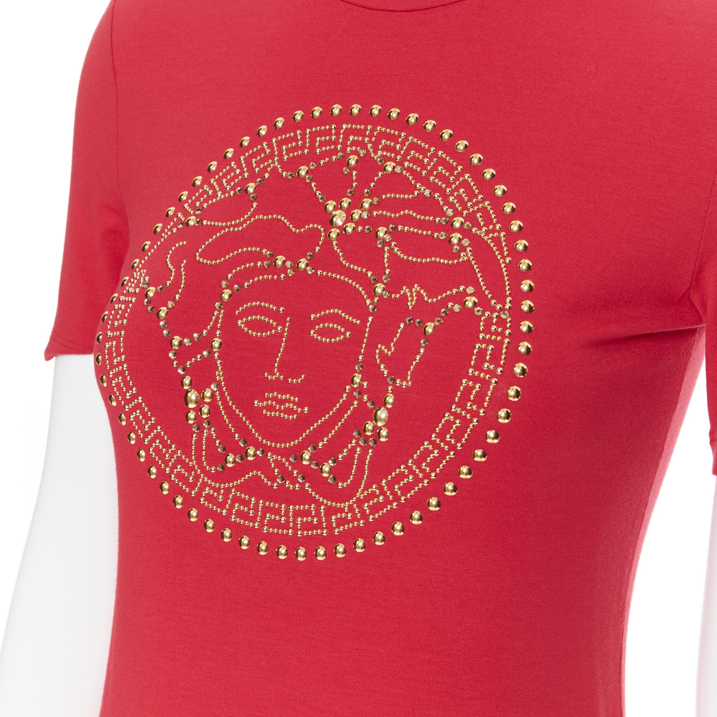 new VERSACE red cotton gold crystal stud embellished Medusa t shirt top IT38 XS
Brand: Versace
Designer: Donatella Versace
Model Name / Style: Medusa tshirt
Material: Cotton
Color: Red
Pattern: Solid
Extra Detail: Red fine cotton. Gold-tone stud and