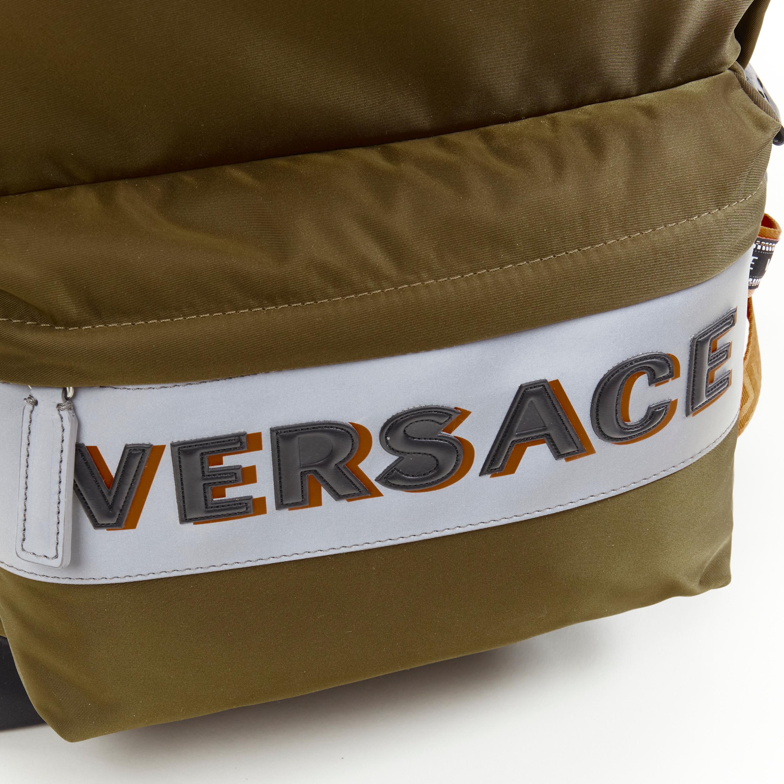 new VERSACE Reflective Logo green nylon orange Greca strap backpack In New Condition In Hong Kong, NT