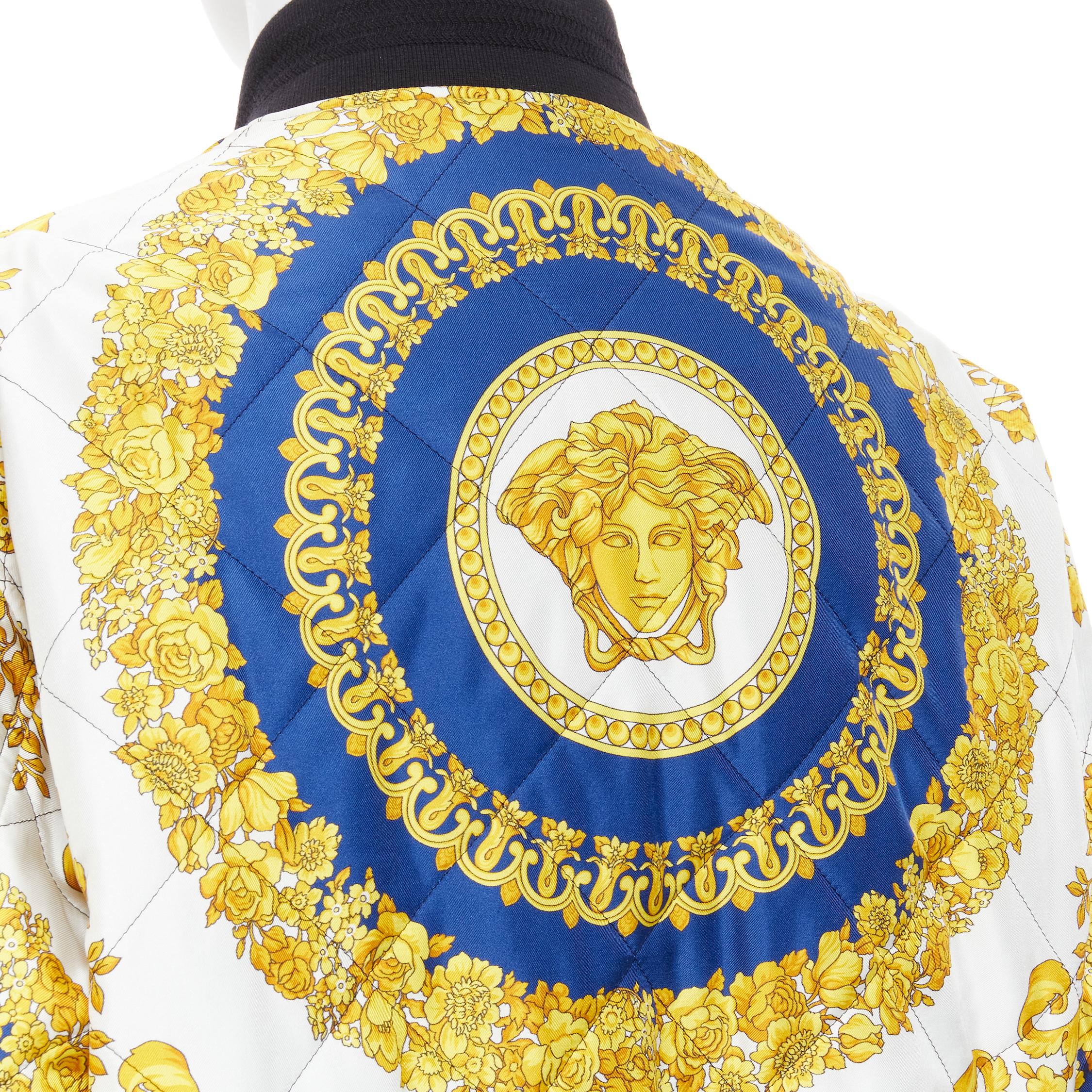 new VERSACE royal blue gold Medusa Barocco diamond quilted bomber jacket IT52 XL 
Reference: TGAS/B01485 
Brand: Versace 
Designer: Donatella Versace 
Material: Silk 
Color: Gold 
Pattern: Floral 
Closure: Zip 
Extra Detail: 100% silk. Royal blue