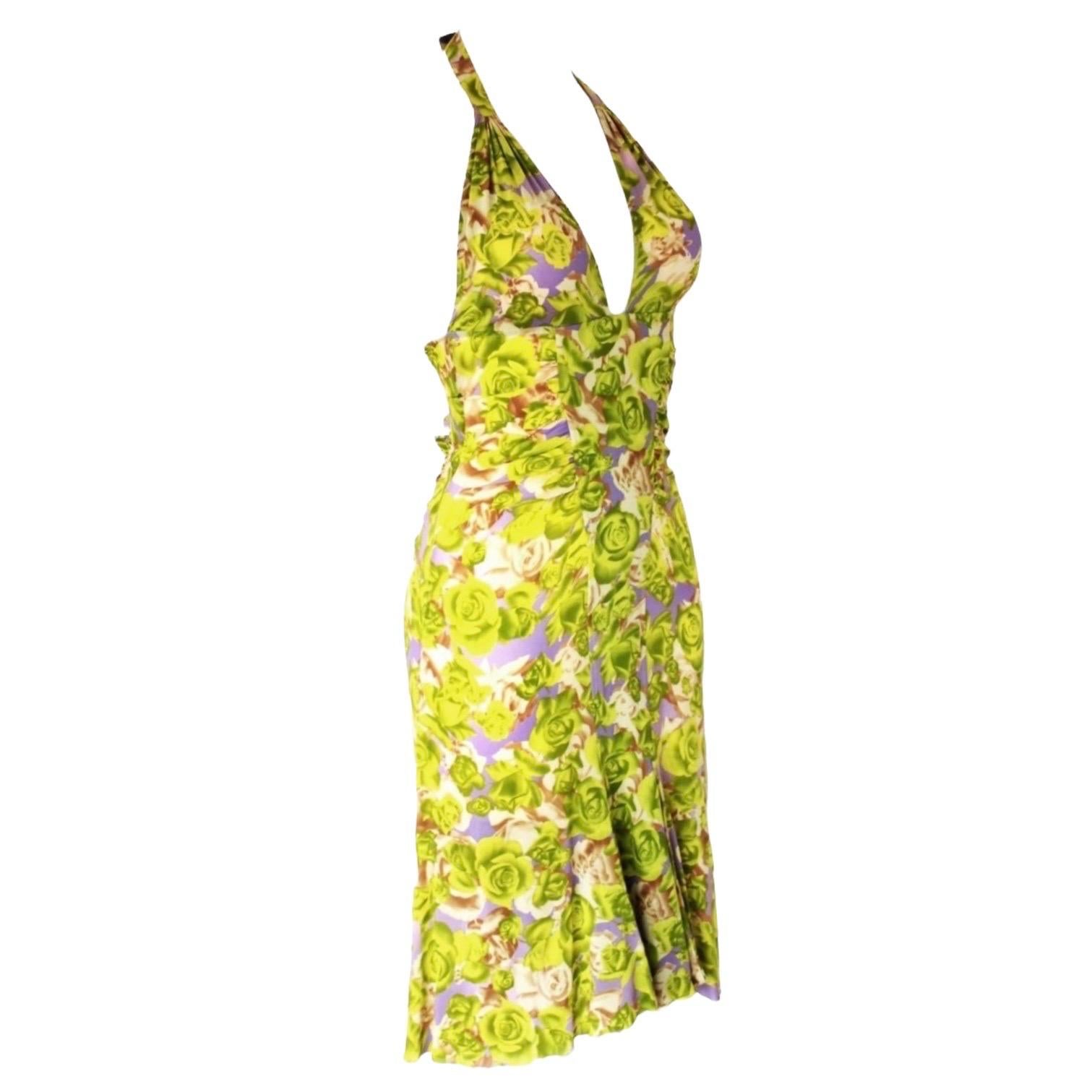 Stunning VERSACE signature dress 
Beautiful rose printed silk
Neckholder with open back
Ruched details
Slight tail - longer on back
Silver-tone hardware details on neckholder and back
Pleated in the back
Completely lined with fine lime silk
Seen on