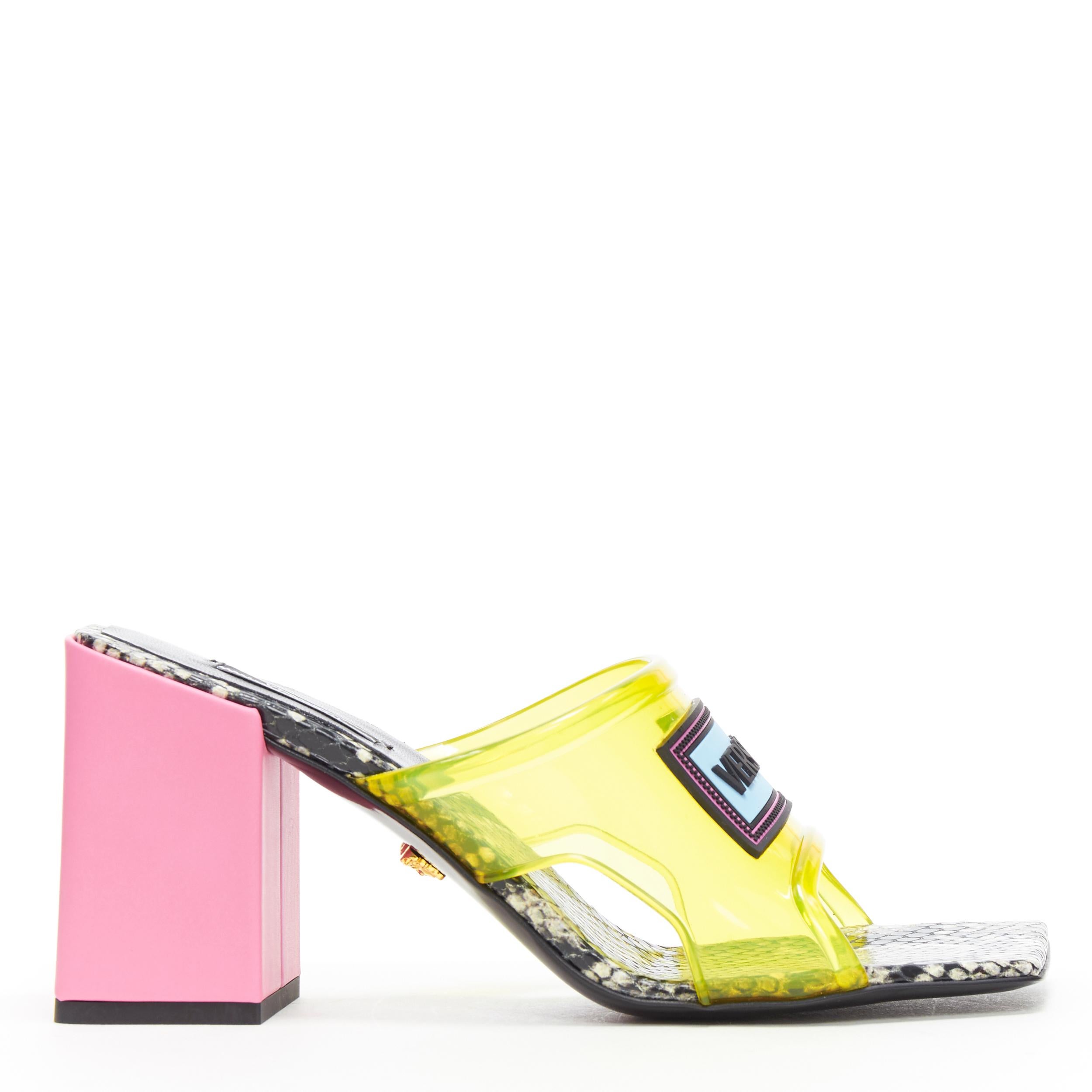 new VERSACE Runway 1990s Vintage Logo yellow PVC pink block heel sandals EU39
Brand: Versace
Designer: Donatella Versace
Collection: 2019
As seen on: Kylie Jenner
Model Name / Style: Mule sandals
Material: PVC
Color: Pink, yellow
Pattern: