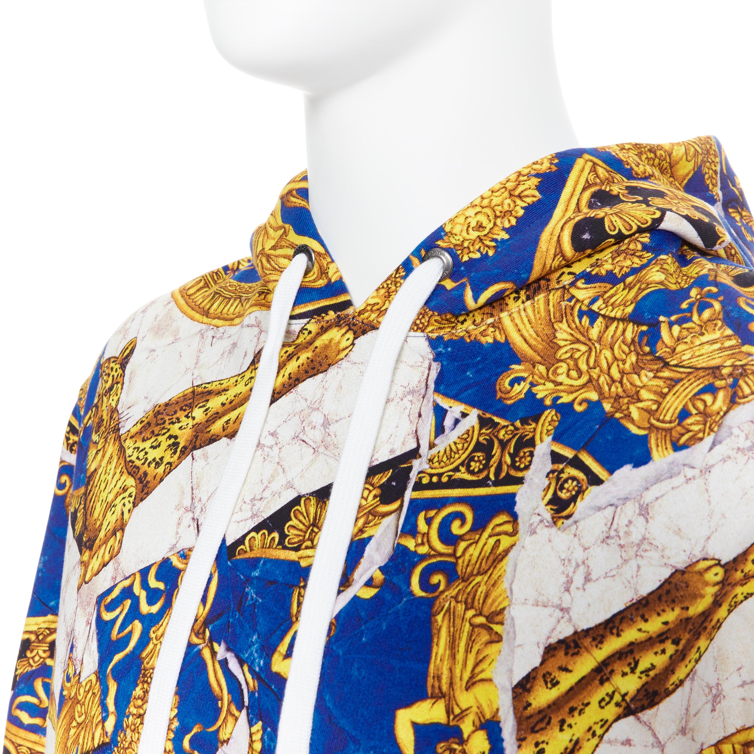 new VERSACE Runway gold blue leopard baroque  marble  print hoodie pullover XXXL
Brand: Versace
Designer: Donatella Versace
Model Name / Style: Hoodie
Material: Cotton
Color: Blue; gold
Pattern: Other; baroque mixed print
Extra Detail: Long