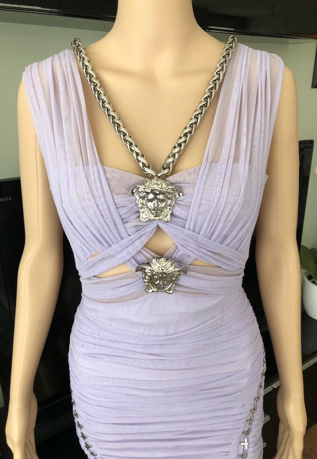 New Versace Runway Medusa and Chain Embellished Cutout Dress IT 42 Editorial Piece!

Lavender Versace knee-length dress featuring V-neck, silver-tone Medusa head embellishments at bust with chain-link trim, ruched accents throughout and zip closure