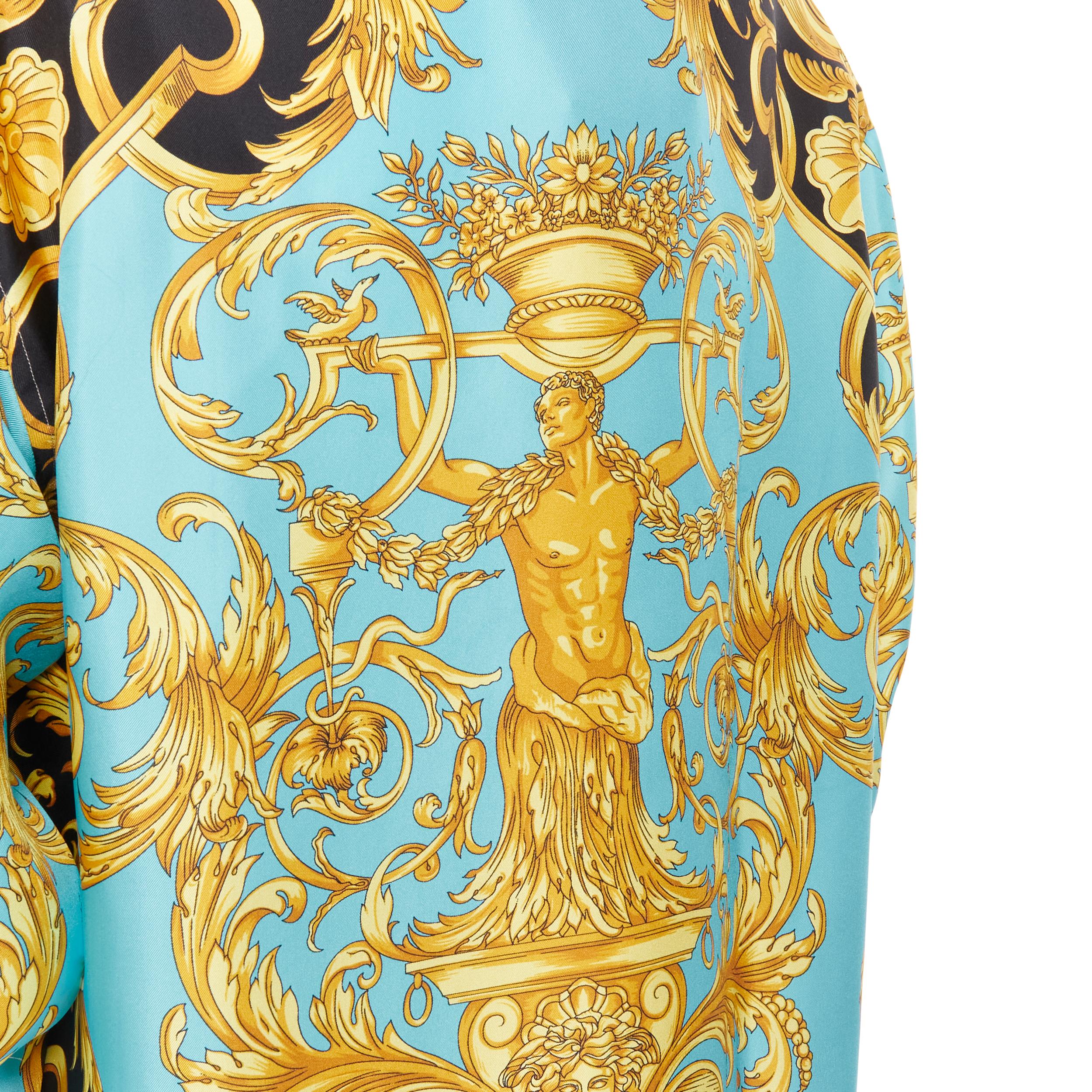 new VERSACE Runway Statue Barocco green blue baroque print silk shirt EU42 XL 
Reference: TGAS/B01497 
Brand: Versace 
Designer: Donatella Versace 
Material: Silk 
Color: Green 
Pattern: Floral 
Closure: Button 
Extra Detail: Crystal gold-tone