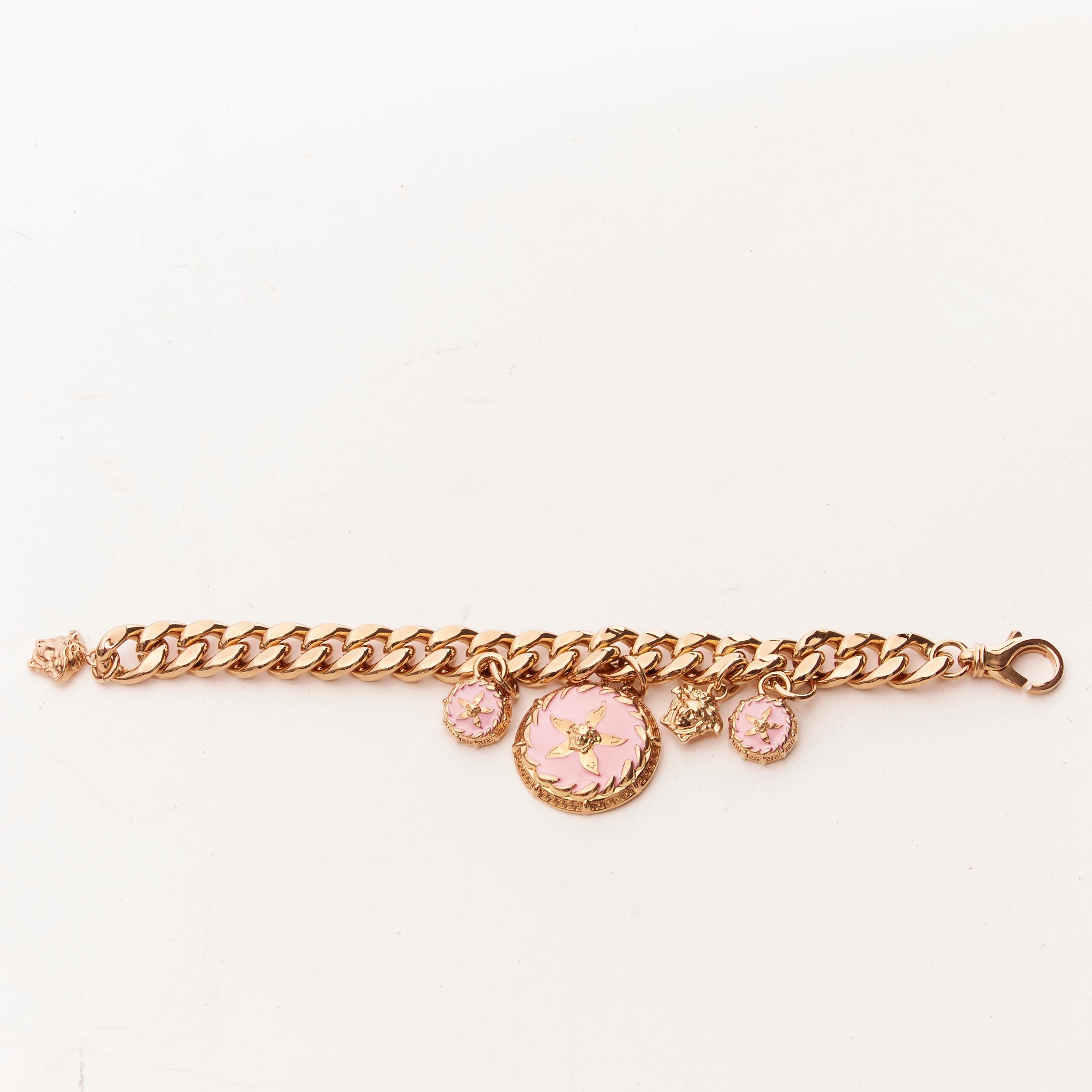 new VERSACE Runway Tresor De La Mer pink enamel starfish Medusa chain bracelet 
Reference: TGAS/C00891 
Brand: Versace 
Designer: Donatella Versace 
Collection: Spring Summer 2021 Runway 
Material: Metal 
Color: Gold 
Pattern: Starfish 
Closure: