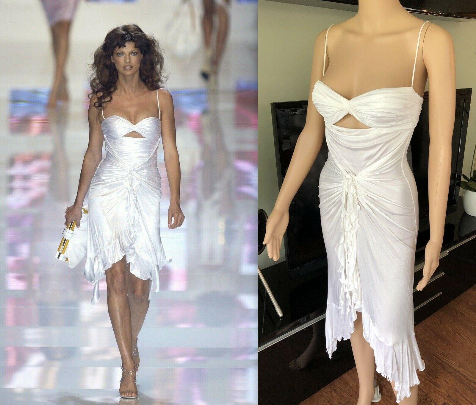 NWT VERSACE S/S 2004 RUNWAY Sexy Plunging Neckline Cutout Dress

Versace sleeveless dress featuring ruffled trim, cutout at bodice, draping throughout and concealed zip closure at back.

Please note this dress is new with tags and Includes clothing