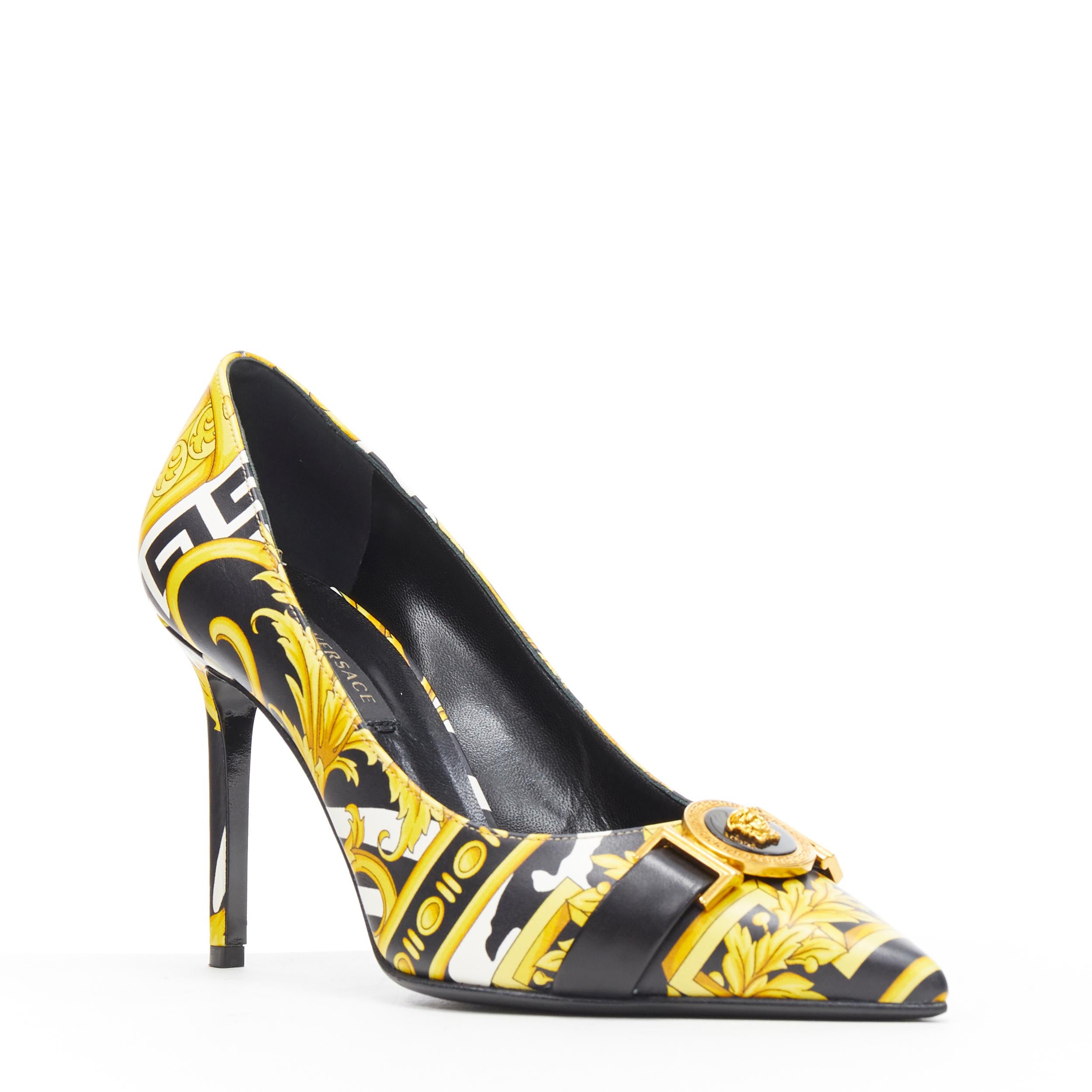 new VERSACE Savage Barocco gold black white Medusa  pointy leather heel EU38
Brand: Versace
Designer: Donatella Versace
Collection: 2019
Model Name / Style: Baroque pump
Material: Leather
Color: Gold, black
Pattern: Floral
Extra Detail: Savage
