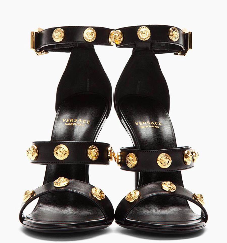 New Versace *Signature* Gold Tone Medusa Black Leather Sandals
Italian size 37.5 - US 7.5
100% Leather, Gold - Tone Medusa Embellishment Throughout,  Ankle Strap with Buckle Fastening, Black Leather Sole.
Stiletto Heel Height - 4 inches
Made in