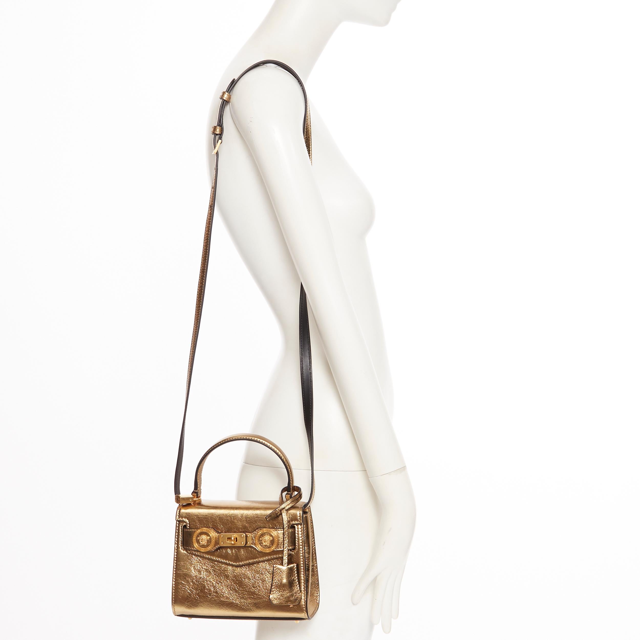 new VERSACE SS18 Diana Icon metallic gold calf leather Medusa mini kelly bag
Brand: Versace
Designer: Donatella Versace
Collection: Spring Summer 2018
Model Name / Style: Diana Icon
Material: Leather; calfskin leather
Color: Gold
Pattern: