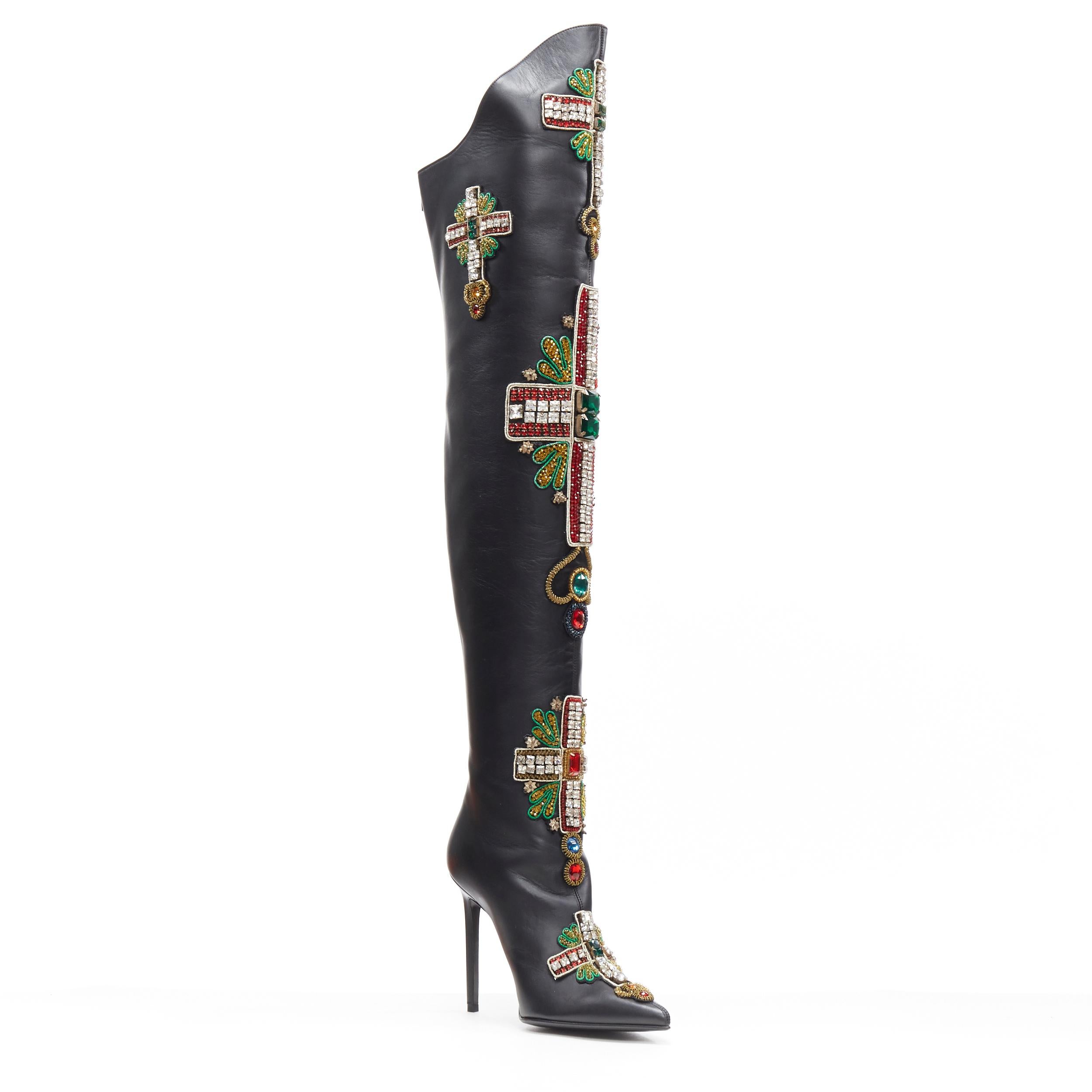 new VERSACE SS18 Runway Byzantine Cross strass jewel embellished knee boot EU38
Brand: Versace
Designer: Donatella Versace
Collection: Spring Summer 2018
Model Name / Style: Byzantine boots
Material: Leather; calf 
Color: Black
Pattern: Abstract;