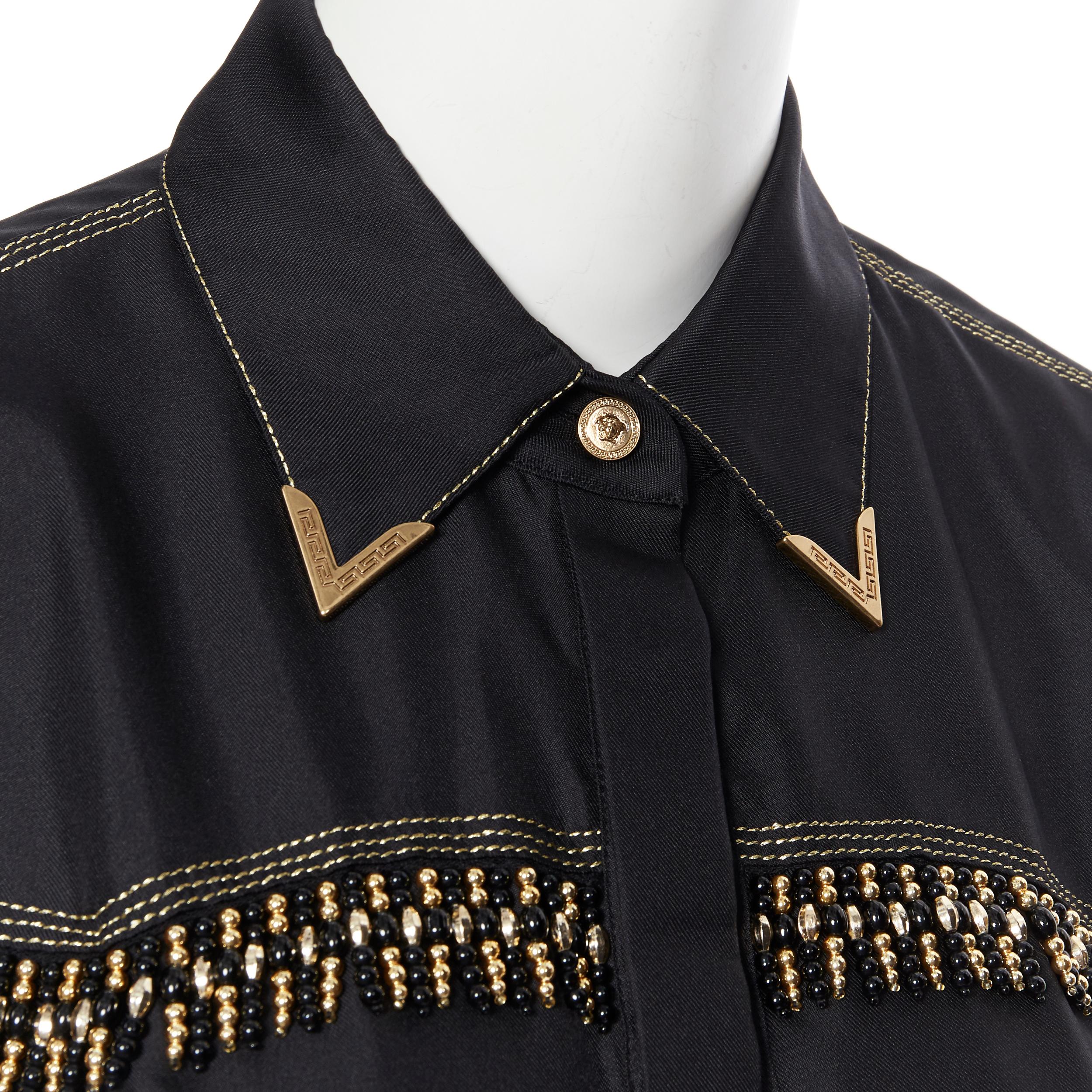 new VERSACE SS18 Tribute Runway black silk gold bead fringe western shirt IT40
Brand: Versace
Designer: Donatella Versace
Collection: Spring Summer 2018
As seen on: Donatella Versace
Model Name / Style: Western shirt
Material: Silk
Color: