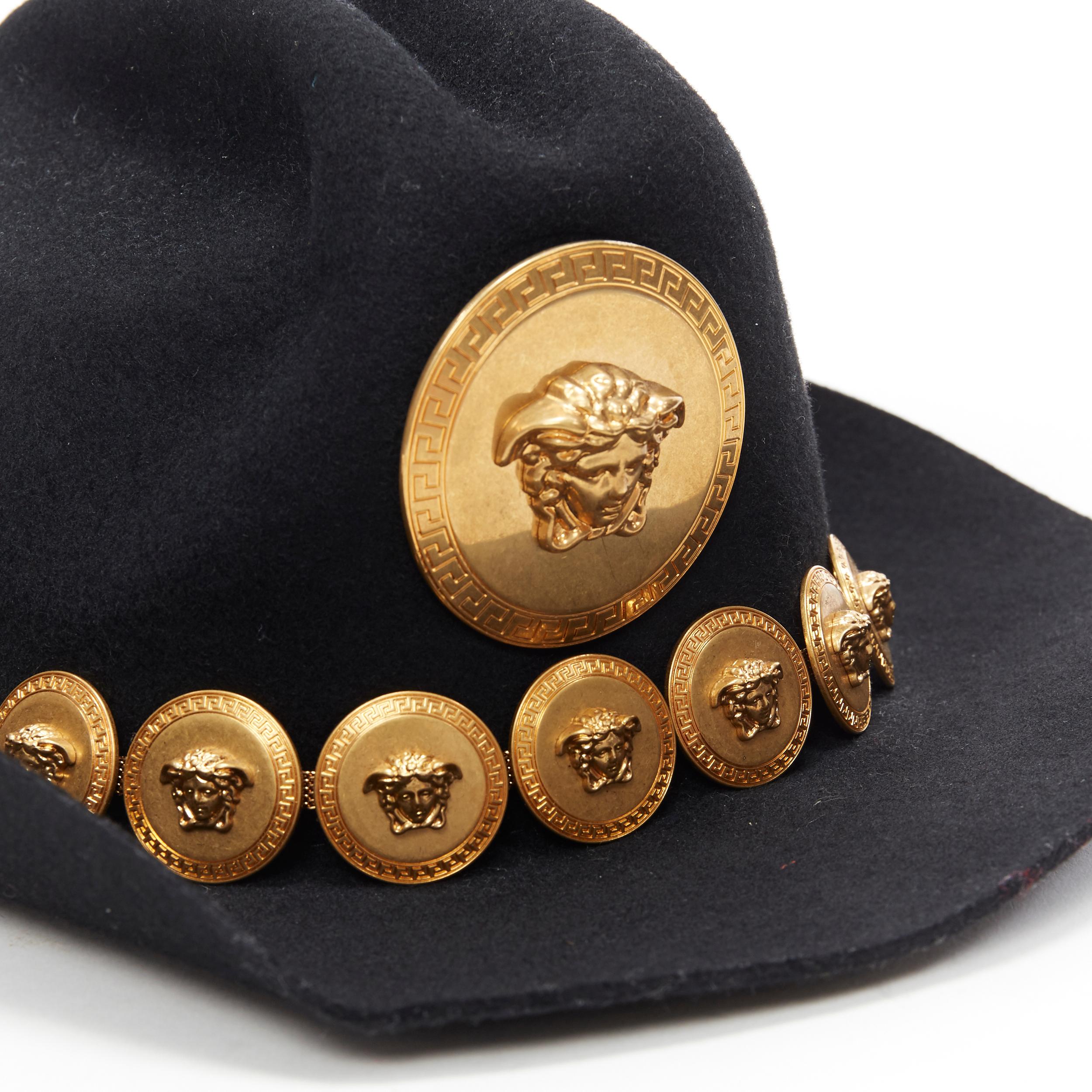 new VERSACE SS18 Tribute Runway black wool felt gold Medusa coin cowboy hat
Brand: Versace
Designer: Donatella Versace
Collection: Spring Summer 2018
Model Name / Style: Medusa cowboy hat
Material: Wool
Color: Black
Pattern: Solid
Extra Detail: