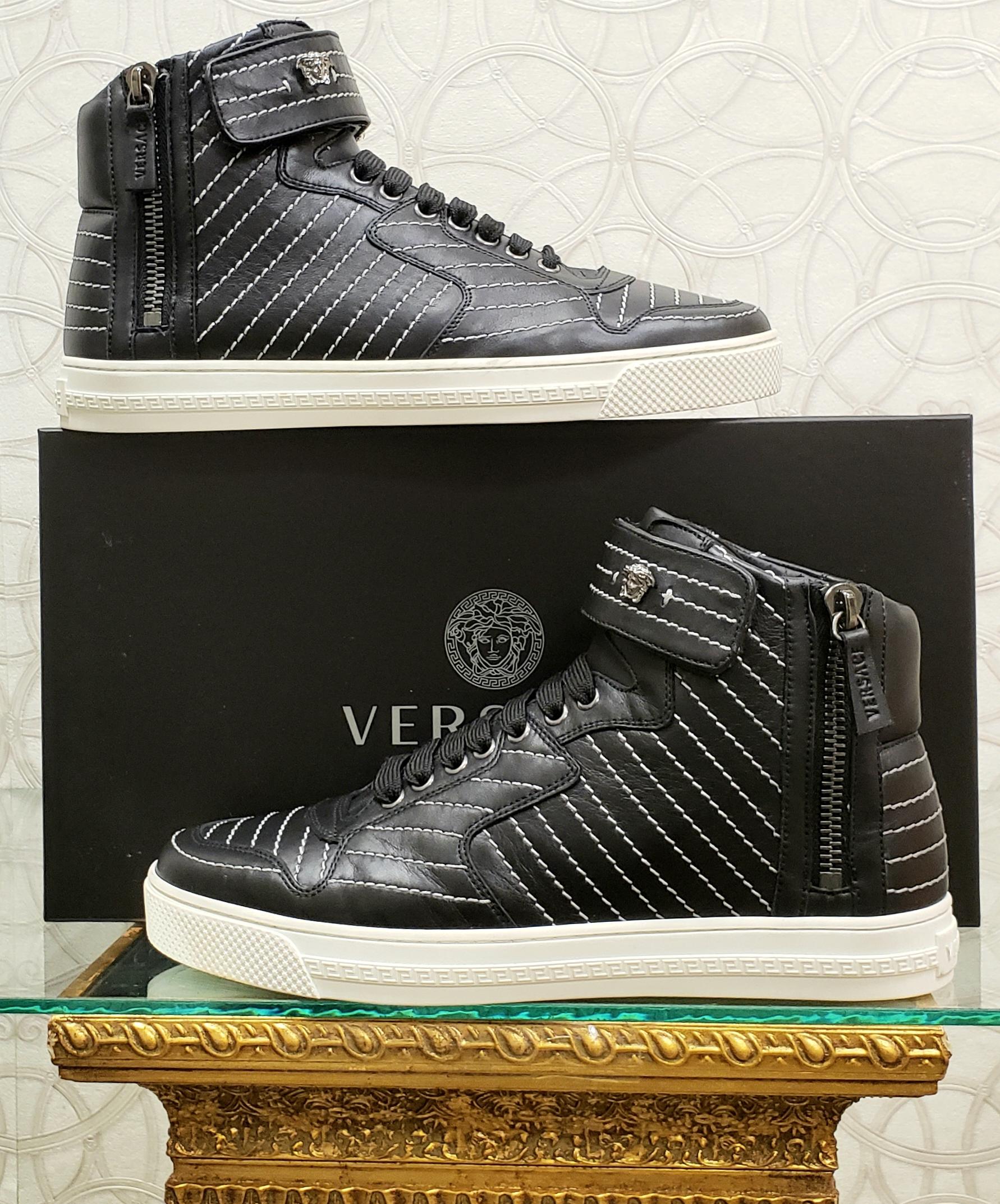 VERSACE 

SOLD OUT!!!

NEW VERSACE HIGH-TOP SNEAKERS with SILVER MEDUSA BUCKLE and side ZIPPER 
  
Stitched with white thread


 Made in Italy 

       
Italian size is 41 - US 8
 insole: 10 1/2