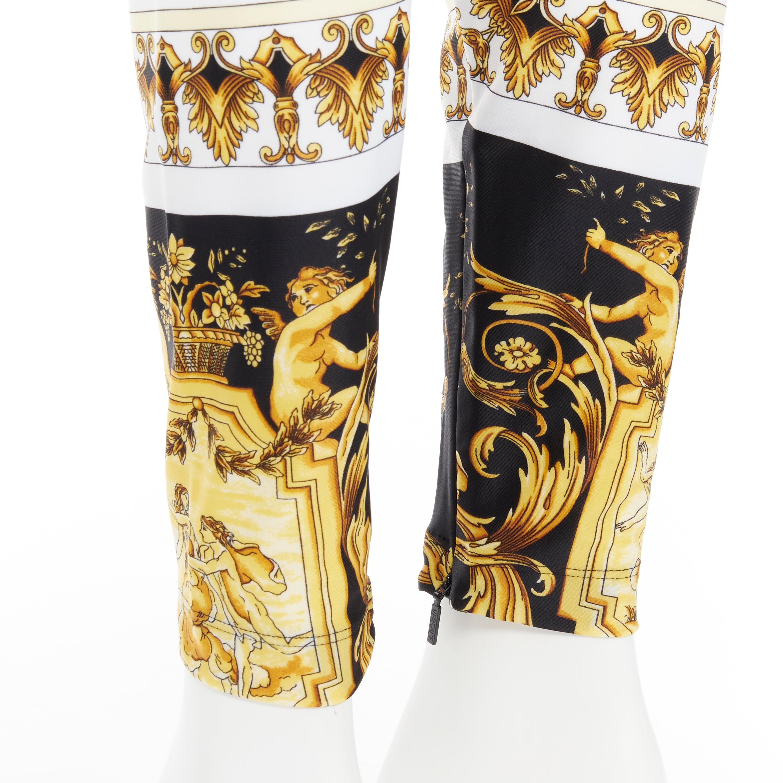 new VERSACE Tribute Baroque 1992 Runway black gold barocco legging pants IT44 M Reference: TGAS/B01496 
Brand: Versace 
Designer: Donatella Versace 
Material: Polyester 
Color: Black 
Pattern: Floral 
Closure: Zip 
Extra Detail: Invisible zip back