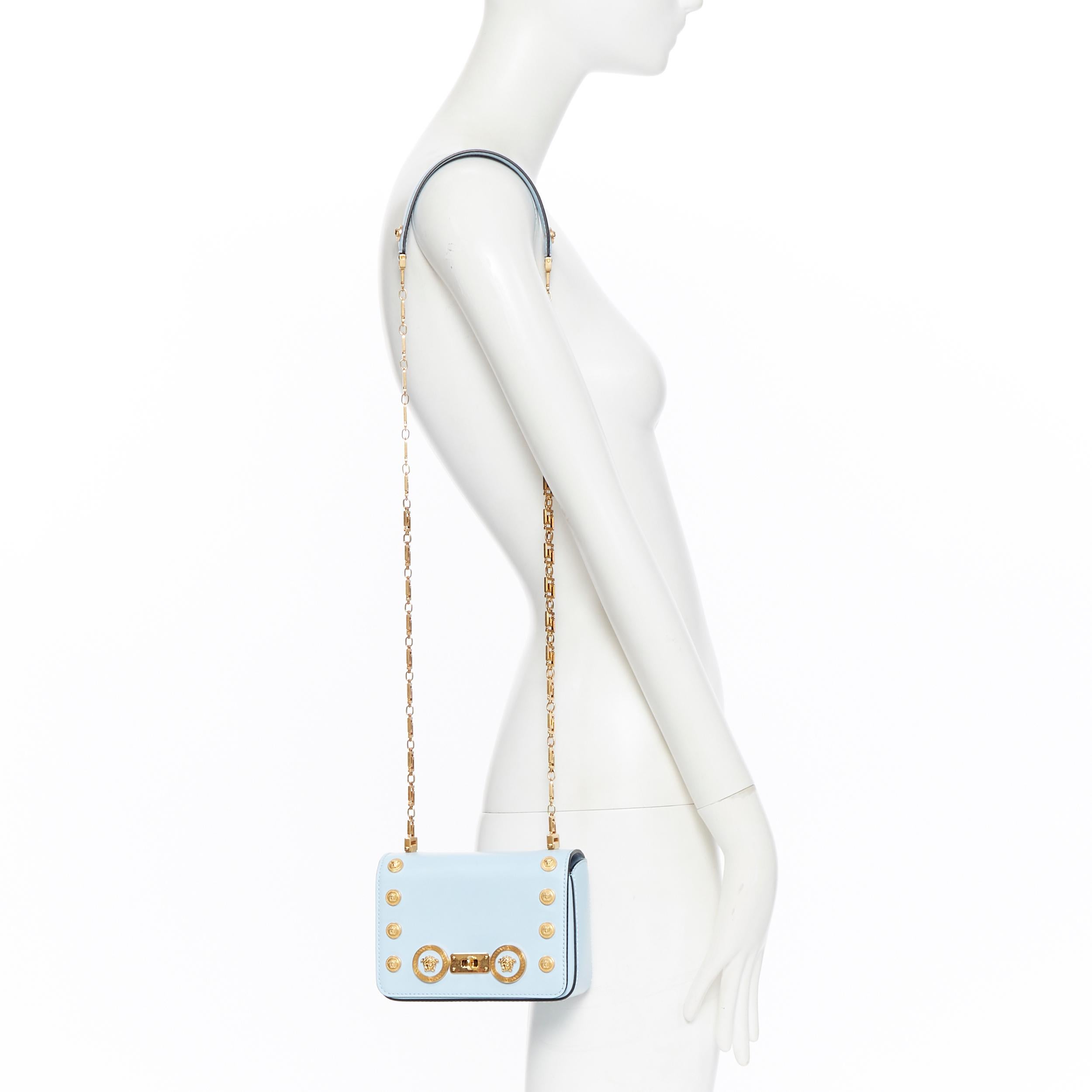 new VERSACE Tribute Icon sky blue gold Medusa turnlock greca chain flap bag
Brand: Versace
Designer: Donatella Versace
Collection: 2018
Model Name / Style: Icon bag
Material: Leather; calf leather
Color: Blue; sky blue
Pattern: Solid
Closure: