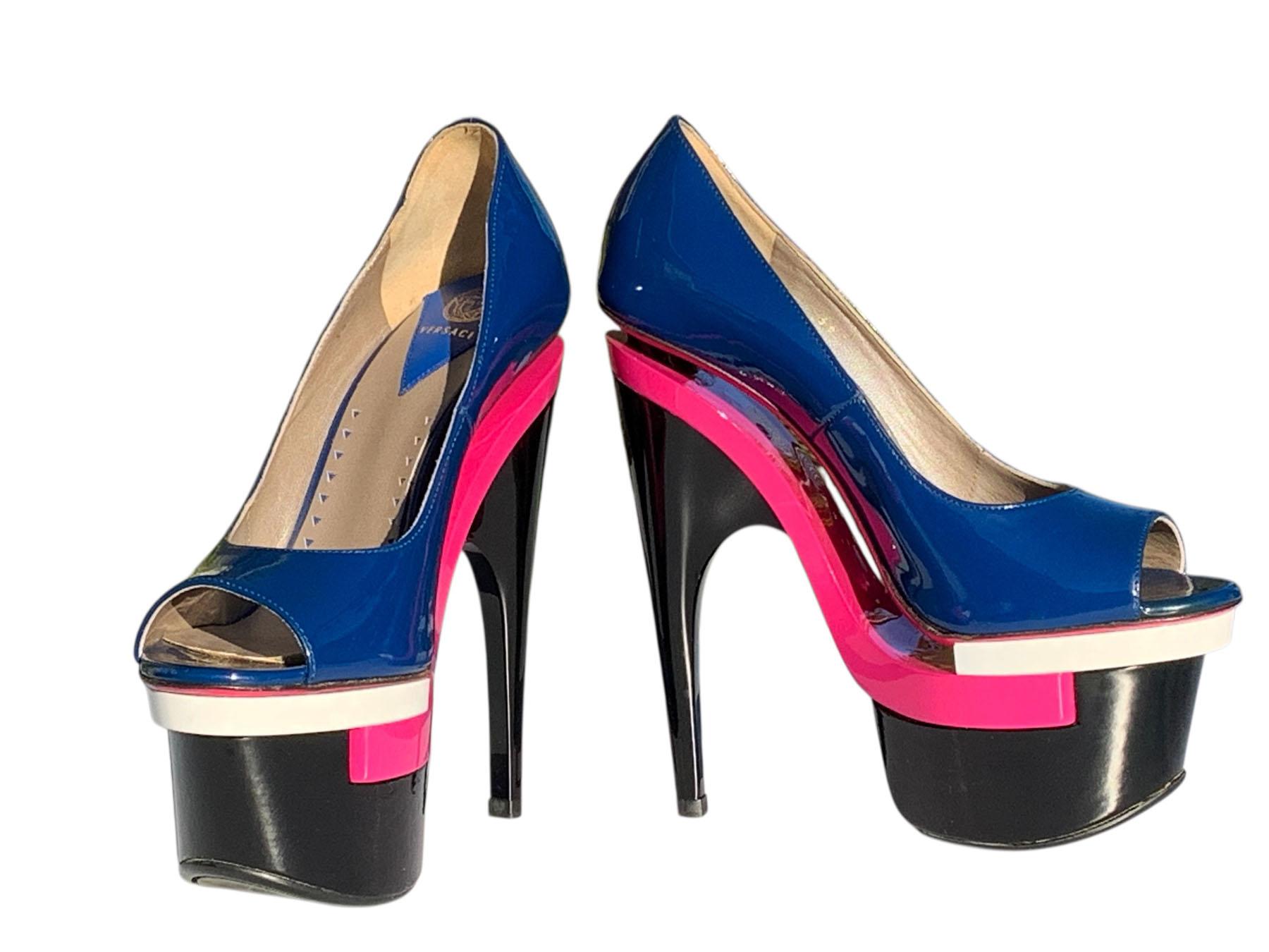 New Versace Patent Leather Pumps Shoes
Italian size 36 - US 6
Colors - Black, White, Blue and Pink.
Triple Platform - 2.75 inches (7 cm)
Sky High Heel - 6 inches (15 cm)
Leather insole and Sole.
Made in Italy.
New without original box.