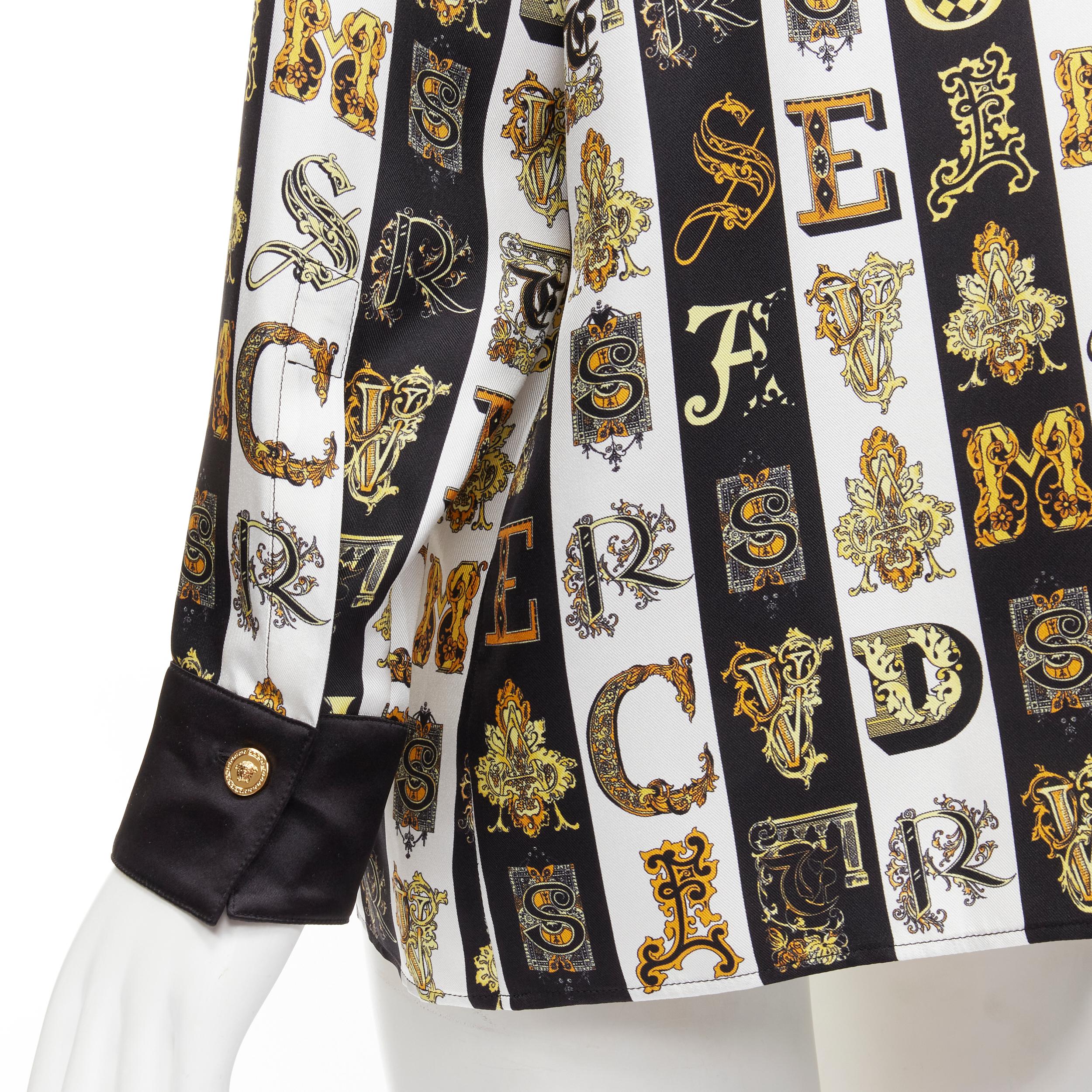 new VERSACE Virtus Alphabet black gold Barocco Medusa button silk shirt IT42 M 
Reference: TGAS/C00889 
Brand: Versace 
Designer: Donatella Versace 
Collection: Virtus Alphabet Runway 
Material: Silk 
Color: Gold 
Pattern: Floral 
Closure: Button