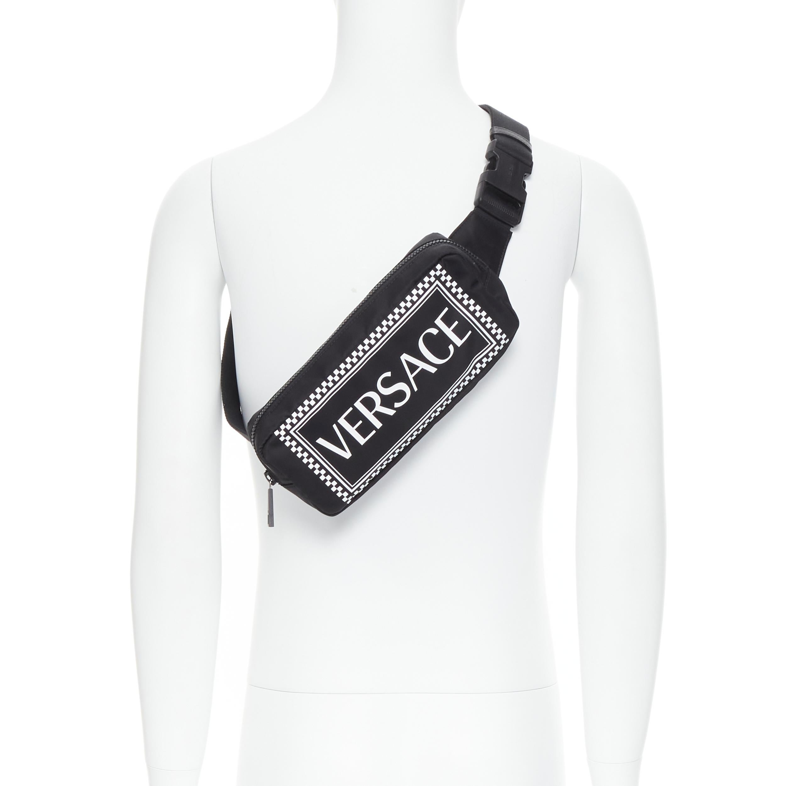 new VERSACE white 90s box logo black nylon crossbody waist belt bag 
Reference: TGAS/B01627 
Brand: Versace 
Designer: Donatella Versace 
Model: 90s logo waist bag 
Material: Nylon 
Color: Black 
Pattern: Solid 
Closure: Buckle 
Extra Detail: