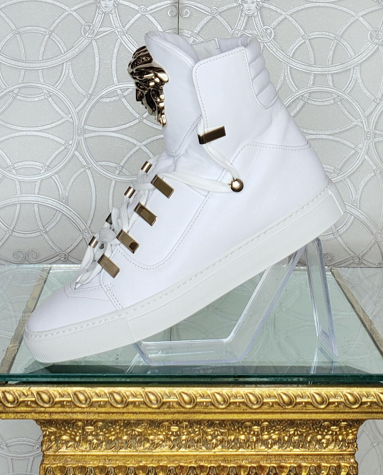 VERSACE

White Sneakers
White  leather, pin detail

3D MEDUSA

Leather lining
Rubber sole

Italian size is  38 - US 8

Comes with Versace box and authenticity card.

 100% authentic guarantee 

PLEASE VISIT OUR STORE FOR MORE GREAT ITEMS 