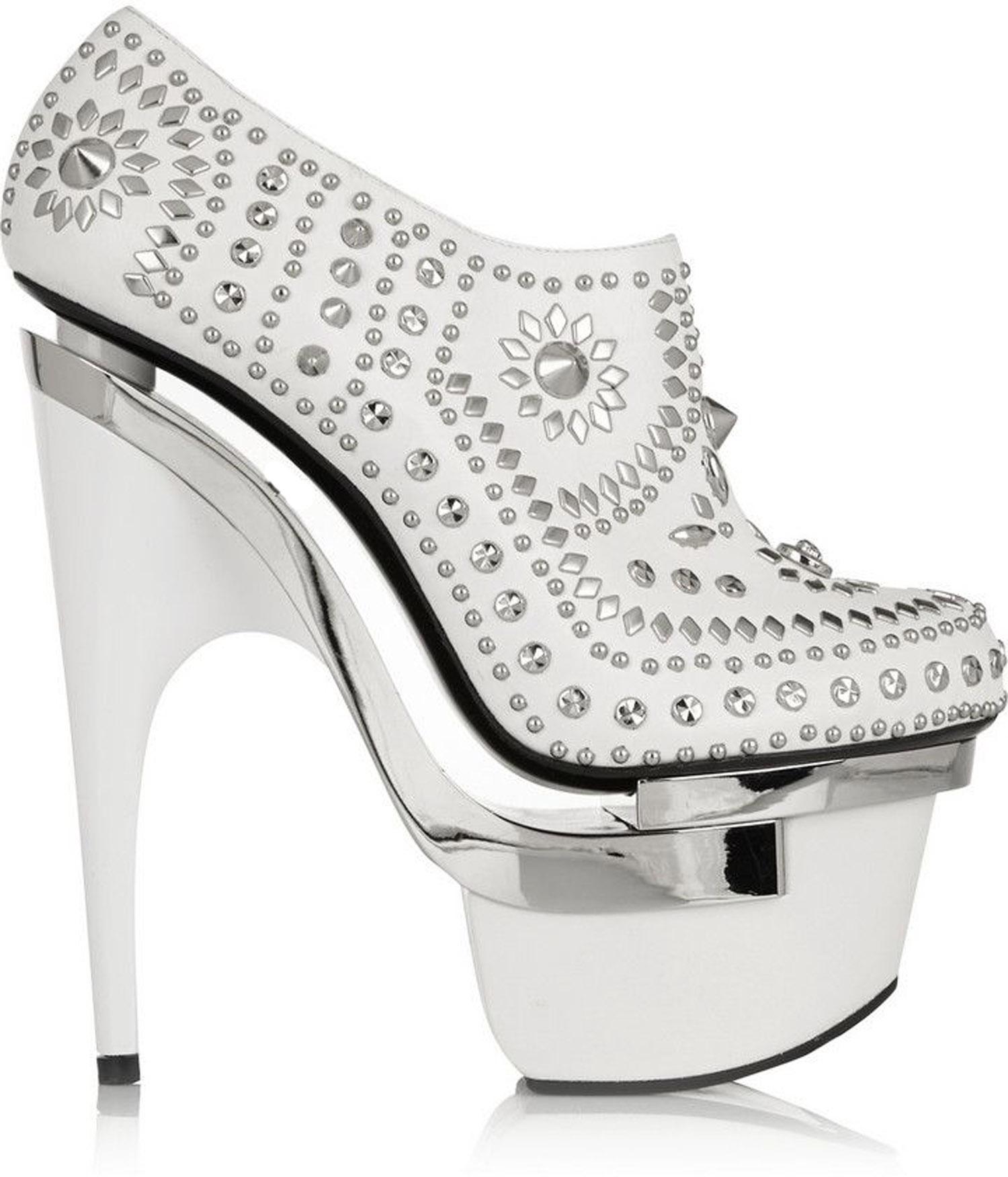 New Versace Leather Studded Platform Ankle Boots Booties
Designer sizes available 37 and 40 - US 7 and 10
White Color, Silver Tone Metal Studs, Triple Platform, Side Zip. 
Heel Height - 6.5 and 7 inches, Platform - 2.5 inches.
Made in Italy.
Retail