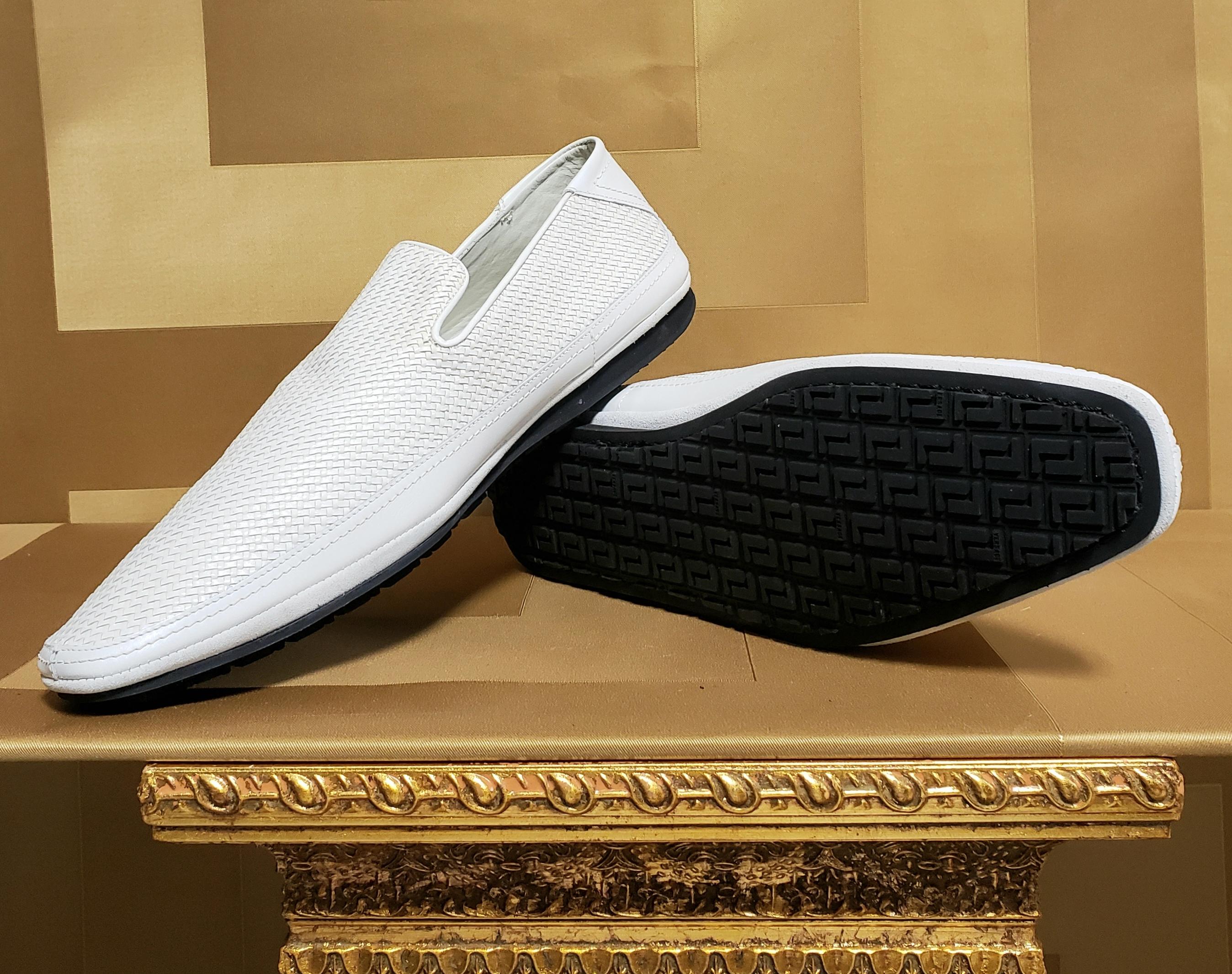 VERSACE 

Chic and casual never looked so good, so slip into these Versace loafers and find out what the fuss is all about.

Non-slip rubber sole

Color: White
Content: 100% Leather

Leather lining

Leather Sole with rubber finish

Made in