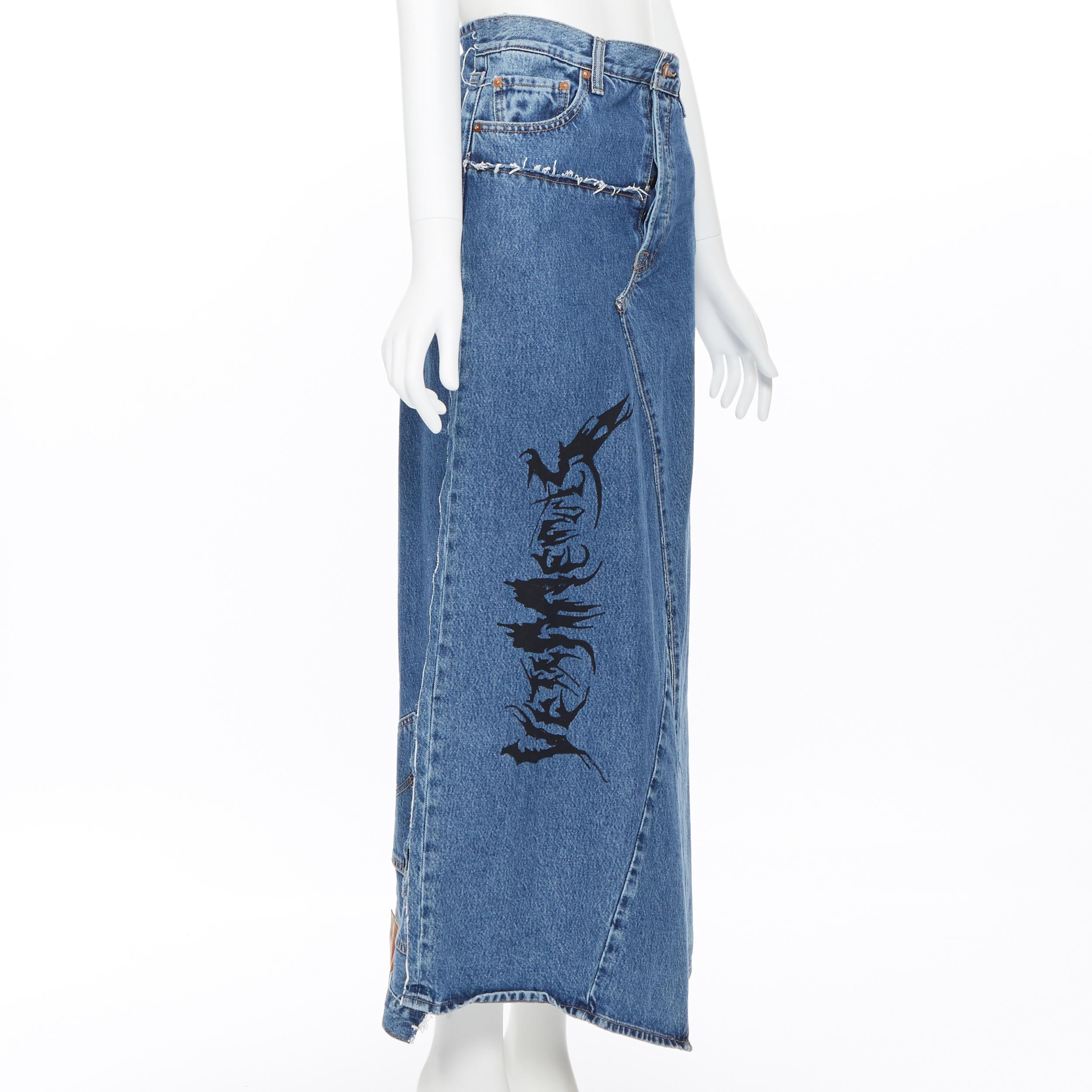 new VETEMENTS AW19 punk logo print deconstructed Levi's patchwork skirt XS Reference: TGAS/A04877 
Brand: Vetements 
Designer: Demna Gvasalia 
Collection: Fall Winter 2019 Runway 
Material: Cotton 
Color: Blue 
Pattern: Solid 
Closure: Button 
Extra