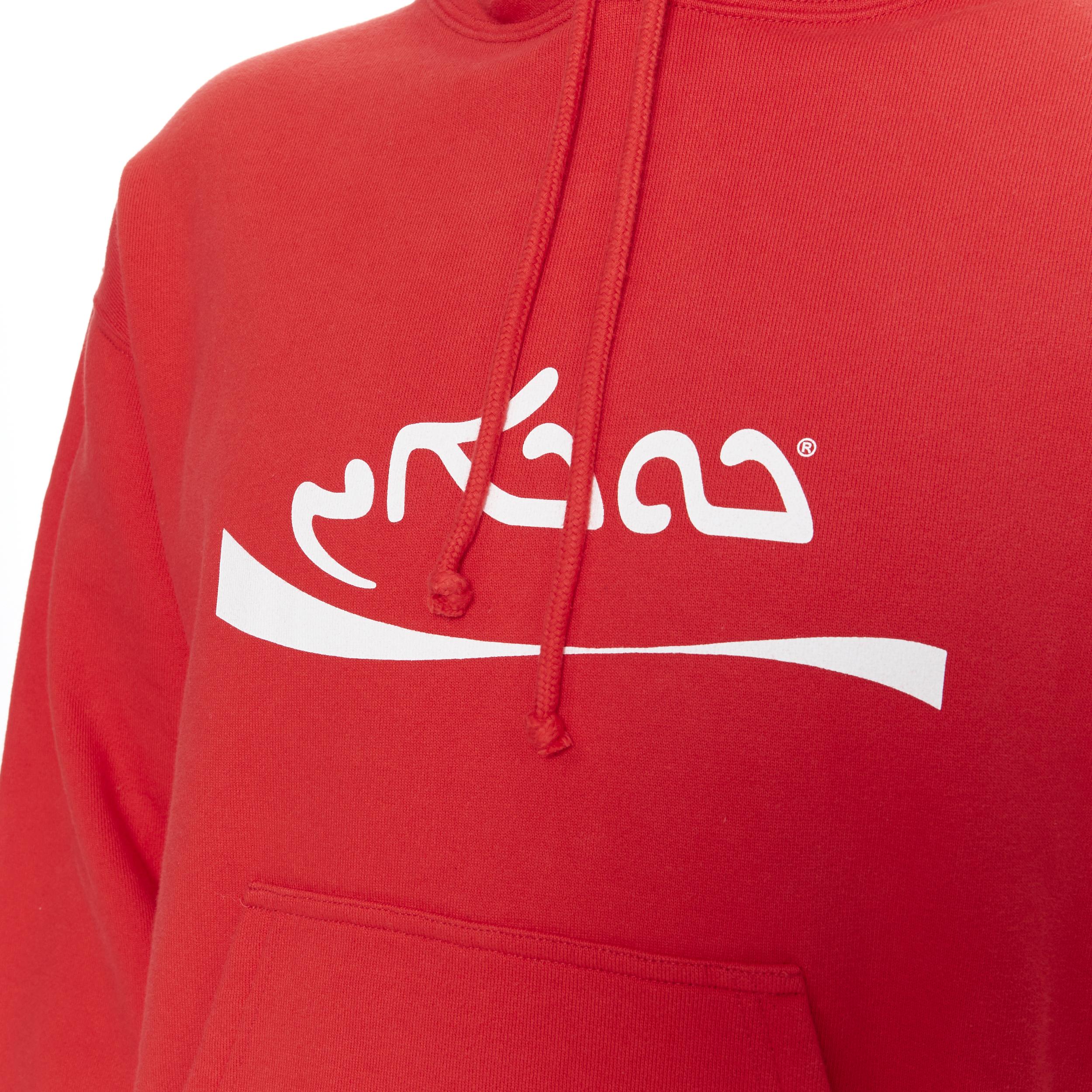 new VETEMENTS AW20 Big Cocaine red arabic Coke logo cropped hoodie sweater L
Brand: Vetements
Collection: AW2020
Model Name / Style: Cropped hoodie
Material: Cotton
Color: Red
Pattern: Solid
Extra Detail: Cropped fit. Long Sleeve.
Made in: