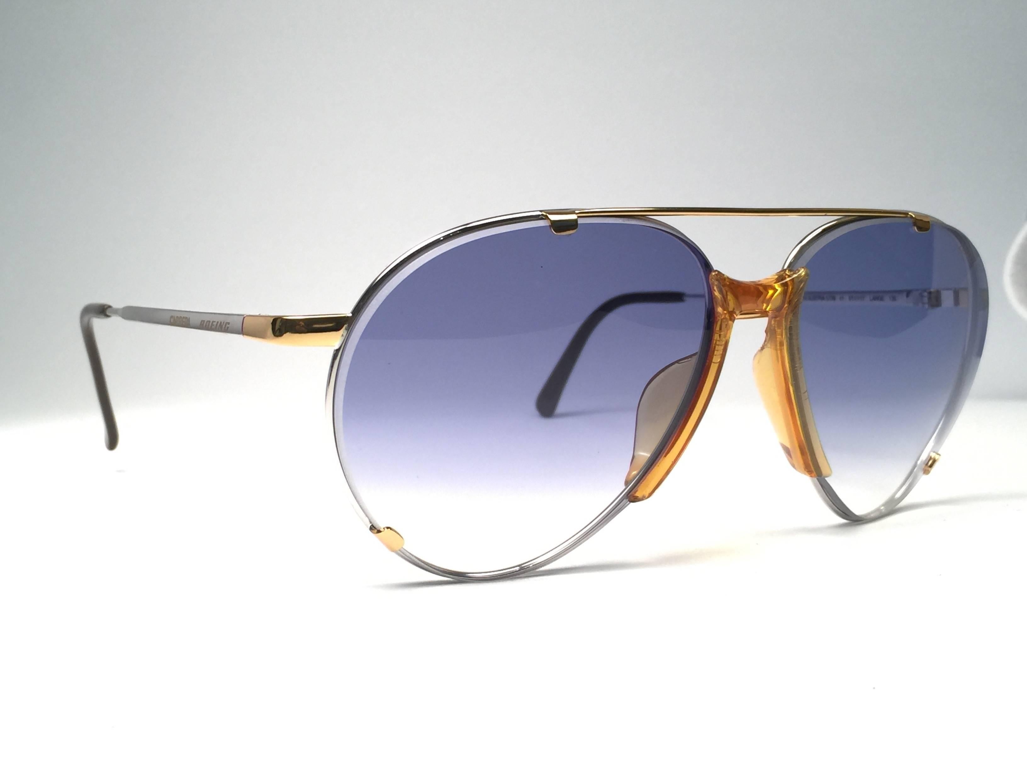 New 1980's Boeing by Carrera Collection aviator silver, gold and acetate details frame with medium blue lenses.   Amazing craftsmanship and quality.   


New, never worn. Made in Austria.