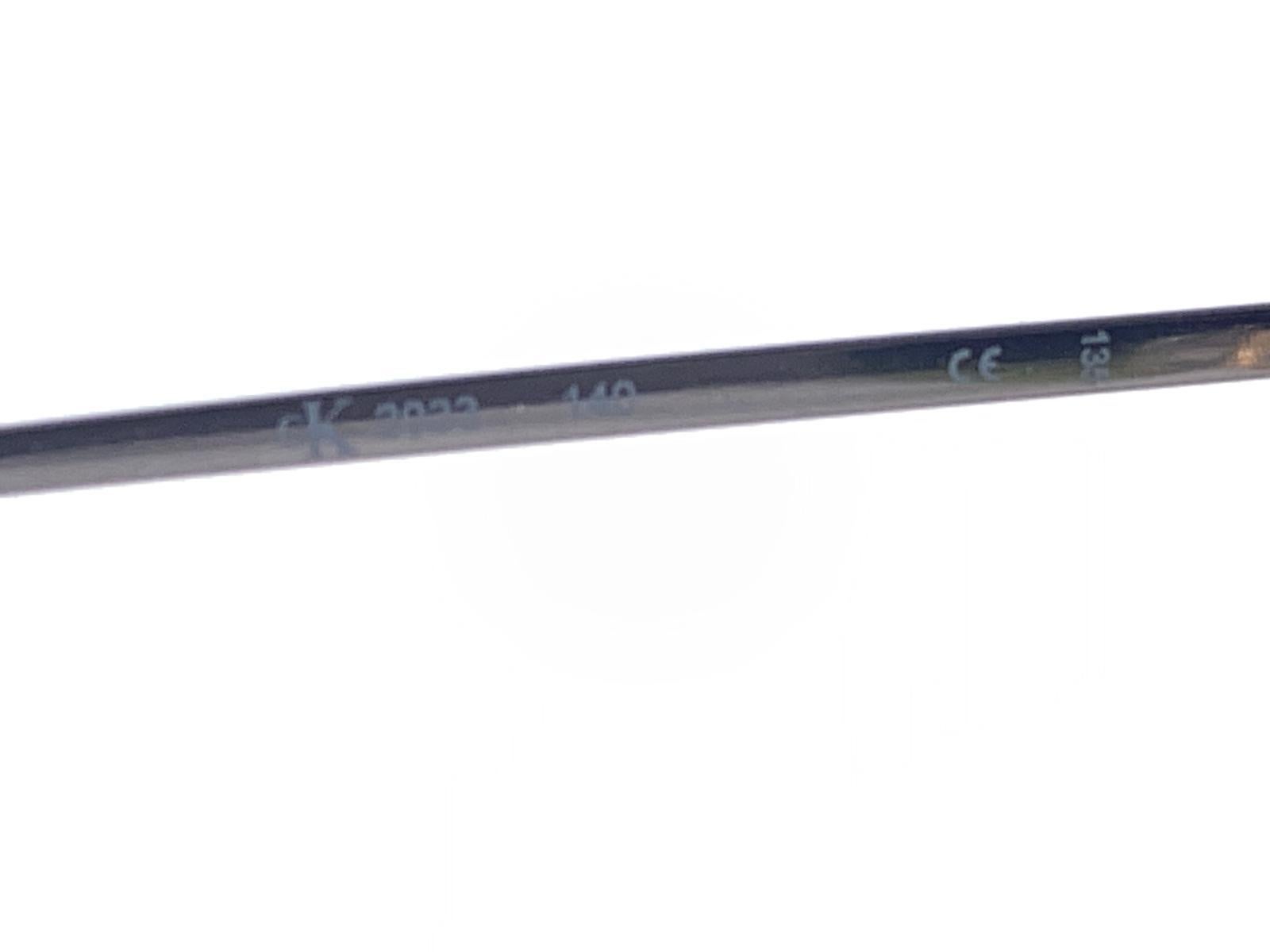 New Vintage Calvin Klein Ck 2033 Small Shiled Y2K Sunglasses Made In Italy In New Condition For Sale In Baleares, Baleares