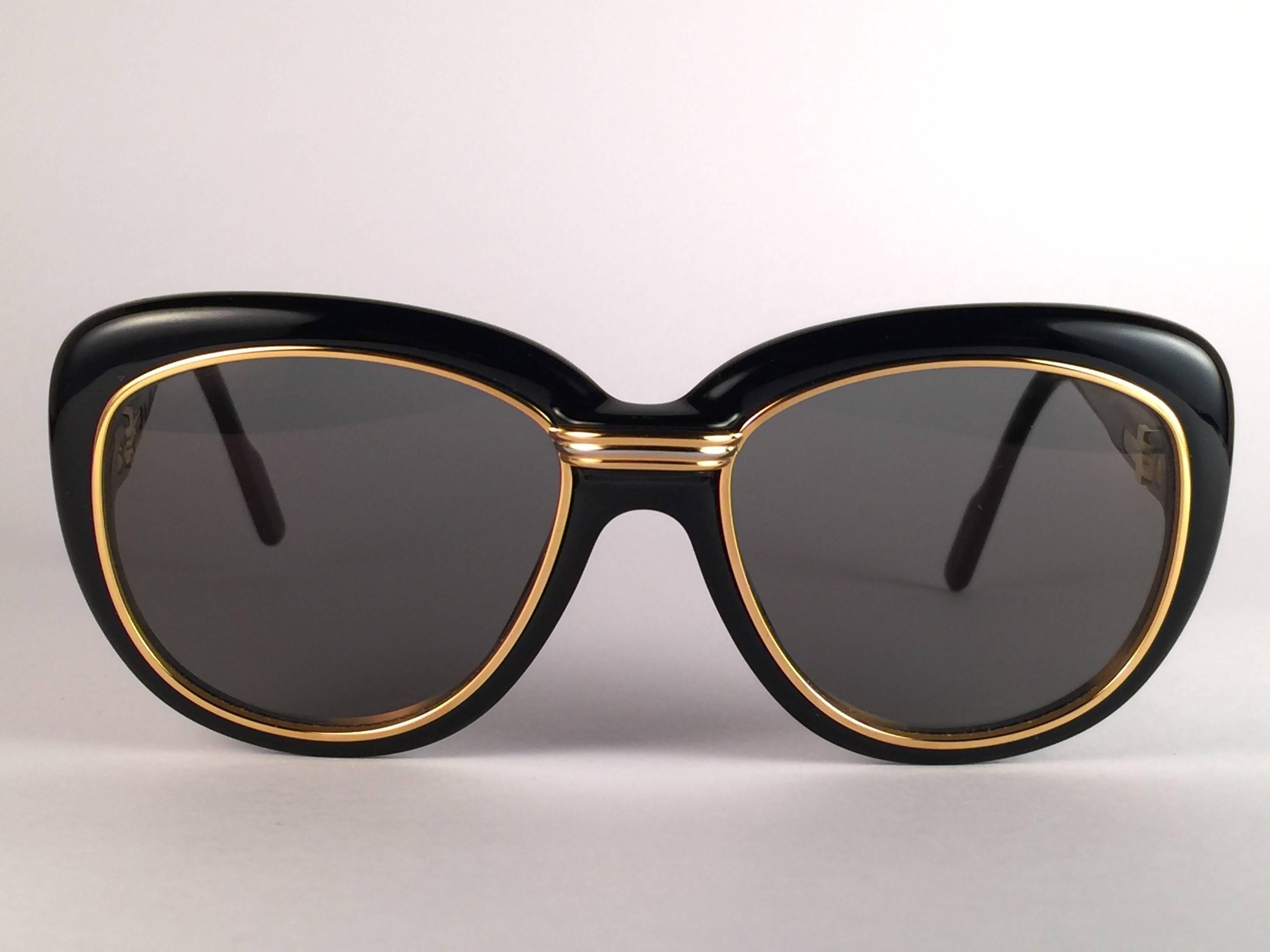 Nuevo Conquete Vintage Cartier  Gafas de sol Francia 51mm Oro Negro e Inserciones Amarillas Gris en venta