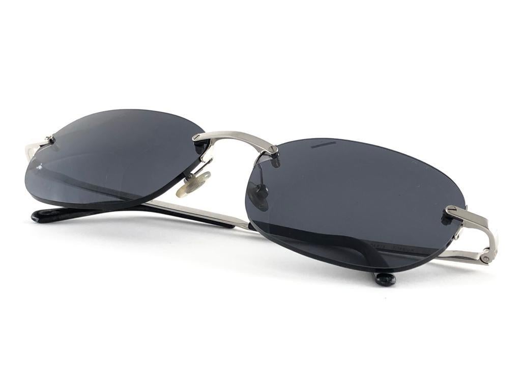 New Vintage Cartier Rimless Titanium Dark Grey Lens France Sunglasses For Sale 2