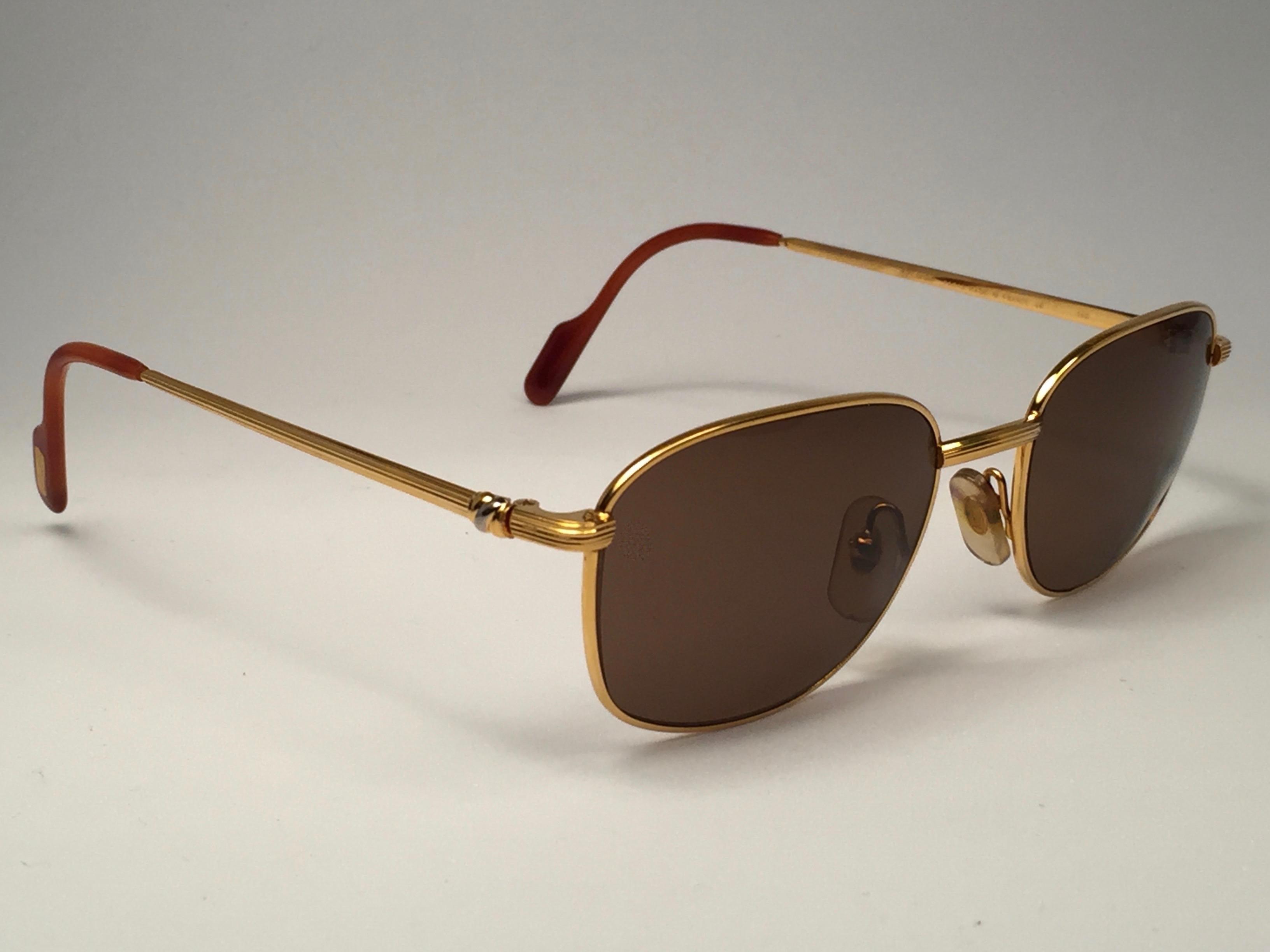 New Vintage Cartier Segur 54MM Gold Plated Brown Lens France 1990 Sunglasses In New Condition For Sale In Baleares, Baleares