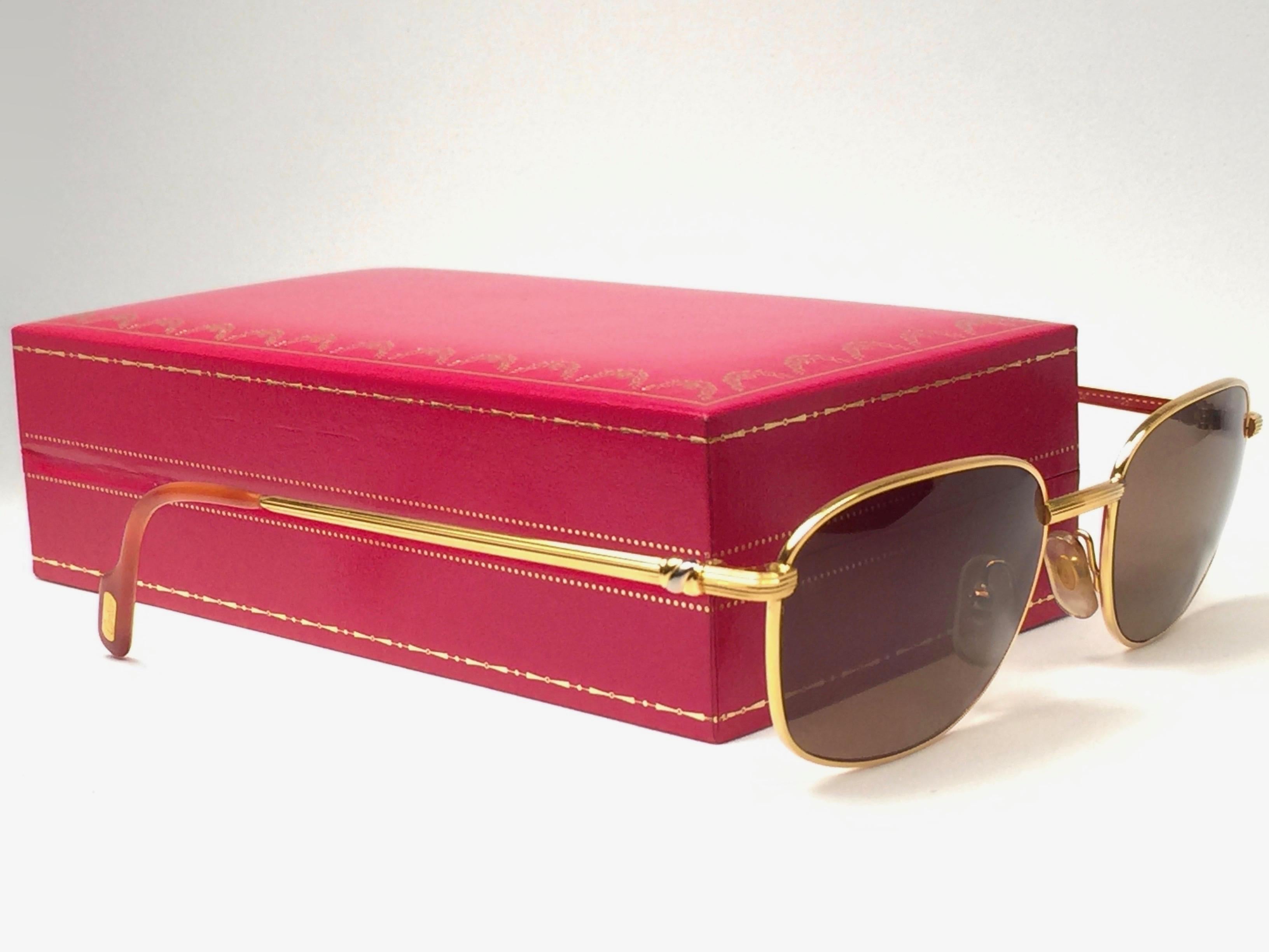Women's or Men's New Vintage Cartier Segur 54MM Gold Plated Brown Lens France 1990 Sunglasses For Sale