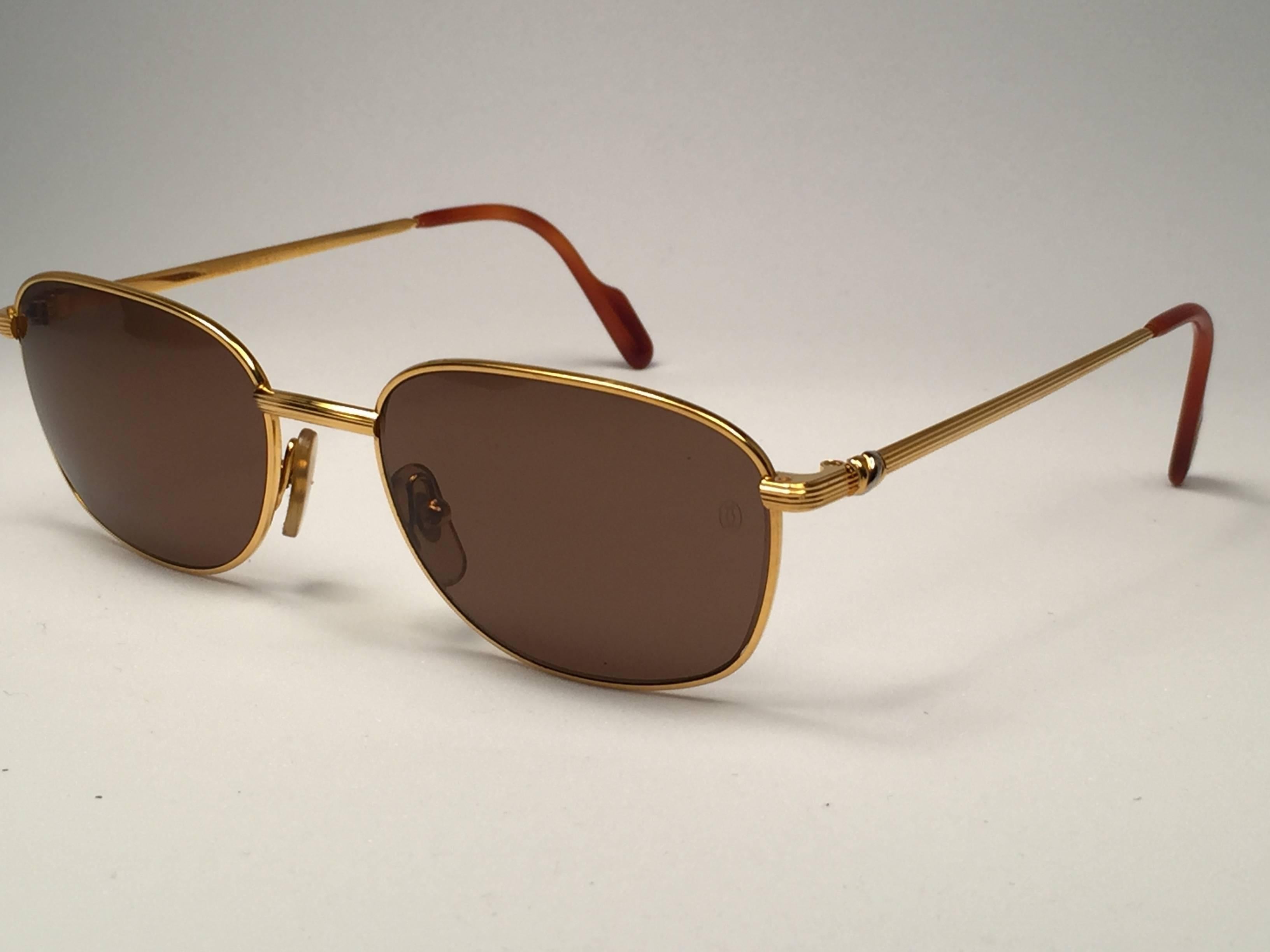 New Vintage Cartier Segur 56MM Gold Plated Brown Lens France 1990 Sunglasses In New Condition In Baleares, Baleares