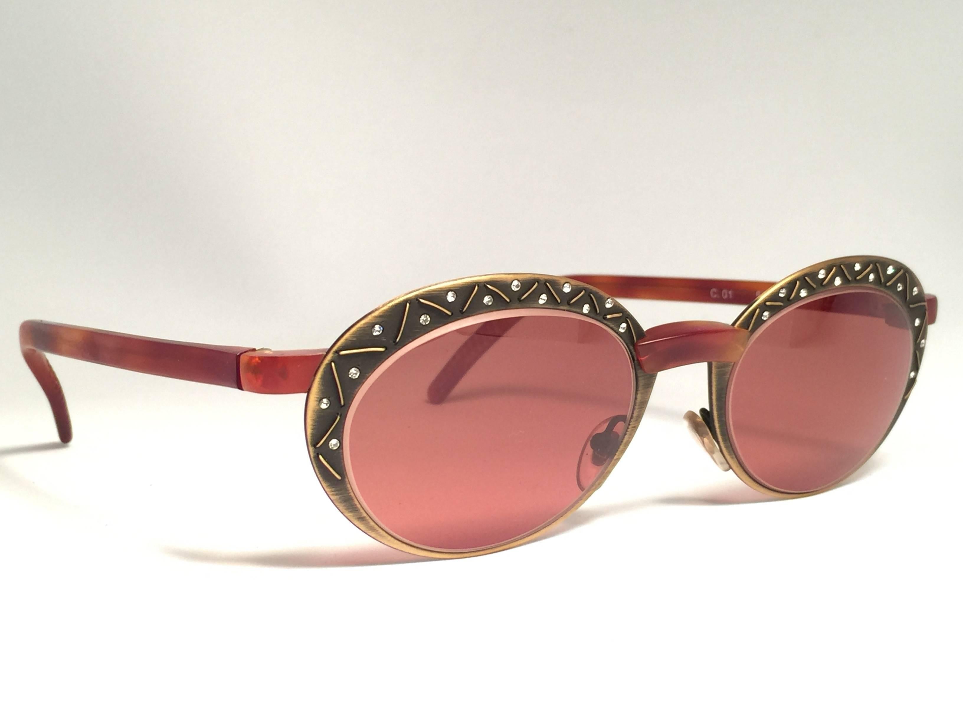 New Vintage Casanova oval copper with rhinestones detailed C01  lenses.

New, never worn or displayed.

Made in Italy.