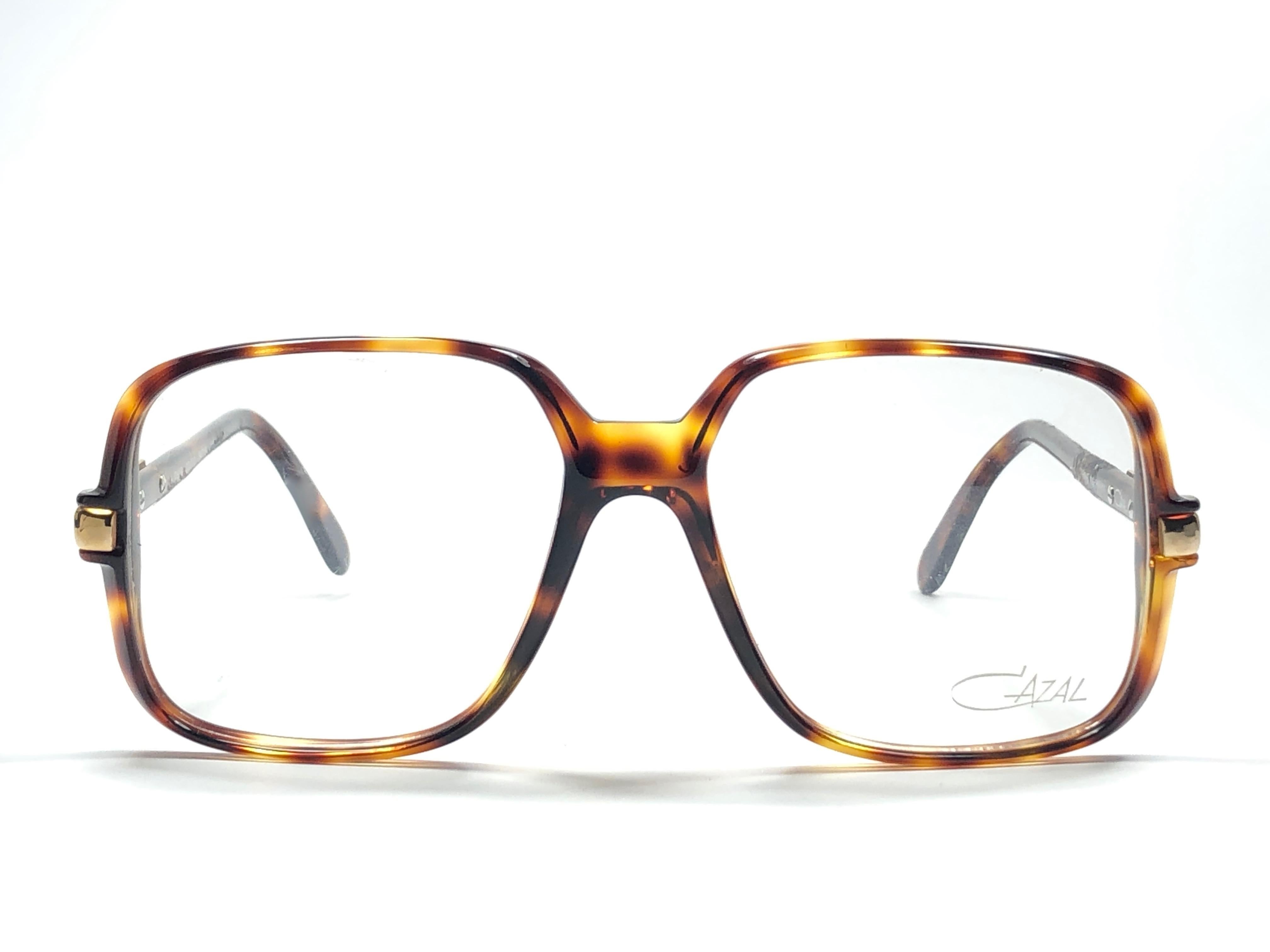 New Vintage Cazal 639 Tortoise with gold details frame. Perfect for reading spectacles. 

Comes with its original Cazal case. This item may show minor sign of wear due to storage.

Made in West Germany.