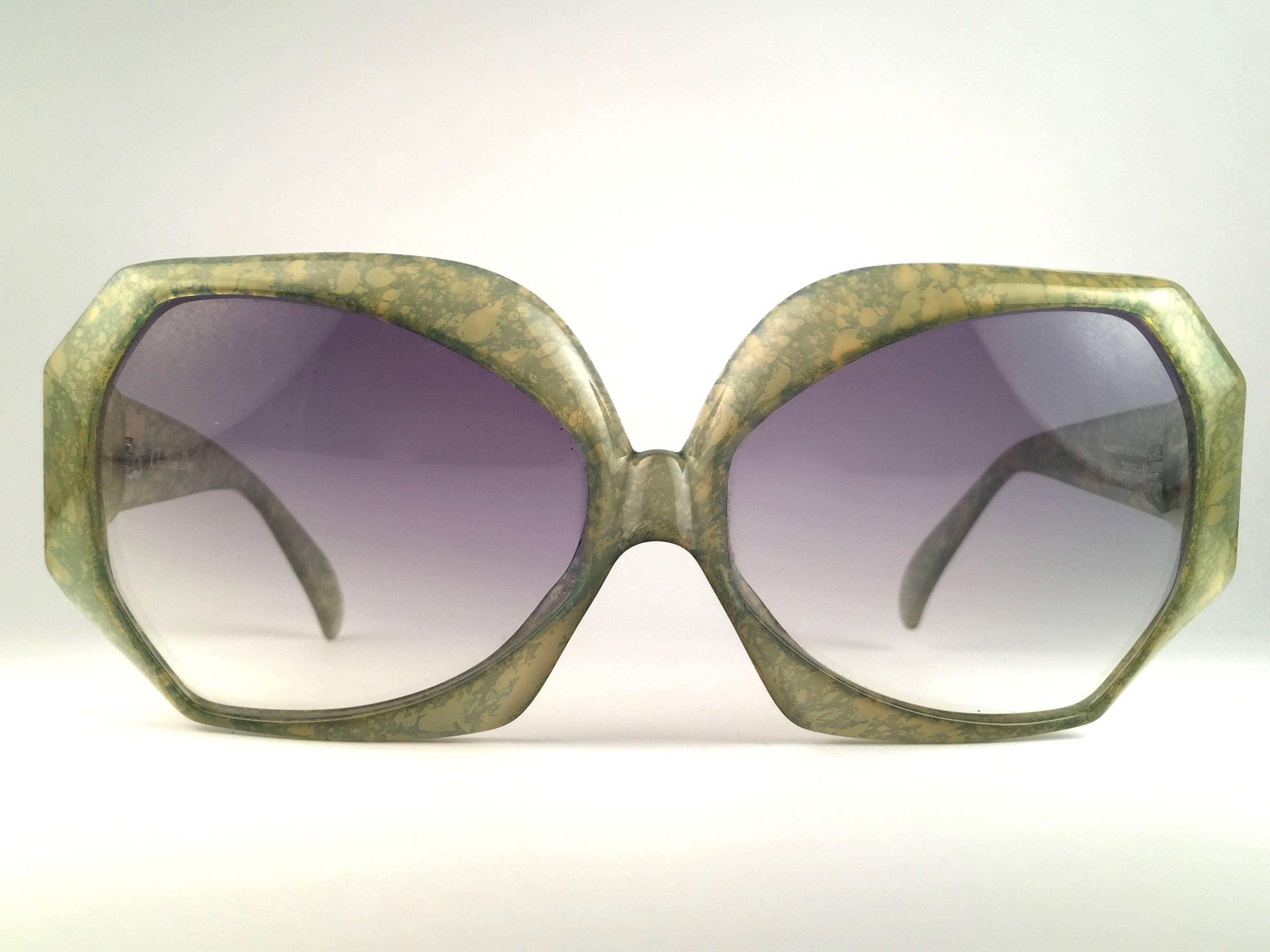 New Vintage Christian Dior 2025 60 Jasped Green frame sporting light green gradient lenses. 

Made in Germany.
 
Produced and design in 1970's.

A collector’s piece!

New, never worn or displayed. Comes with its original silver Christian Dior