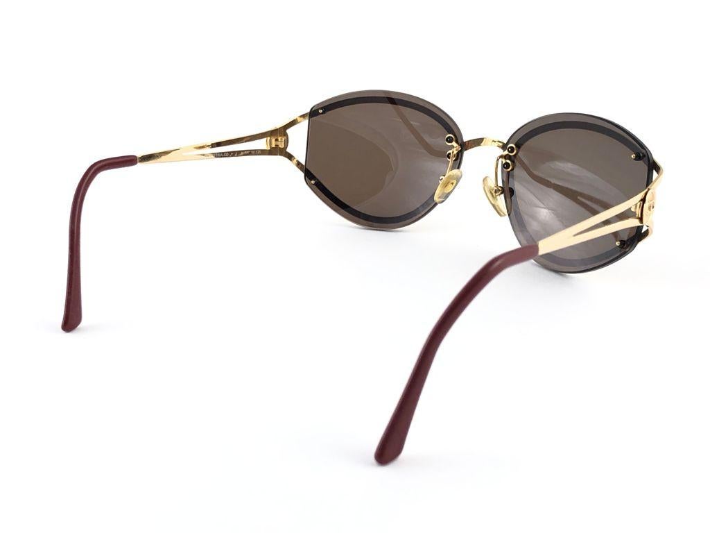 New Vintage Christian Dior Brown & Gold Optyl Made in Austria Sunglasses In New Condition For Sale In Baleares, Baleares