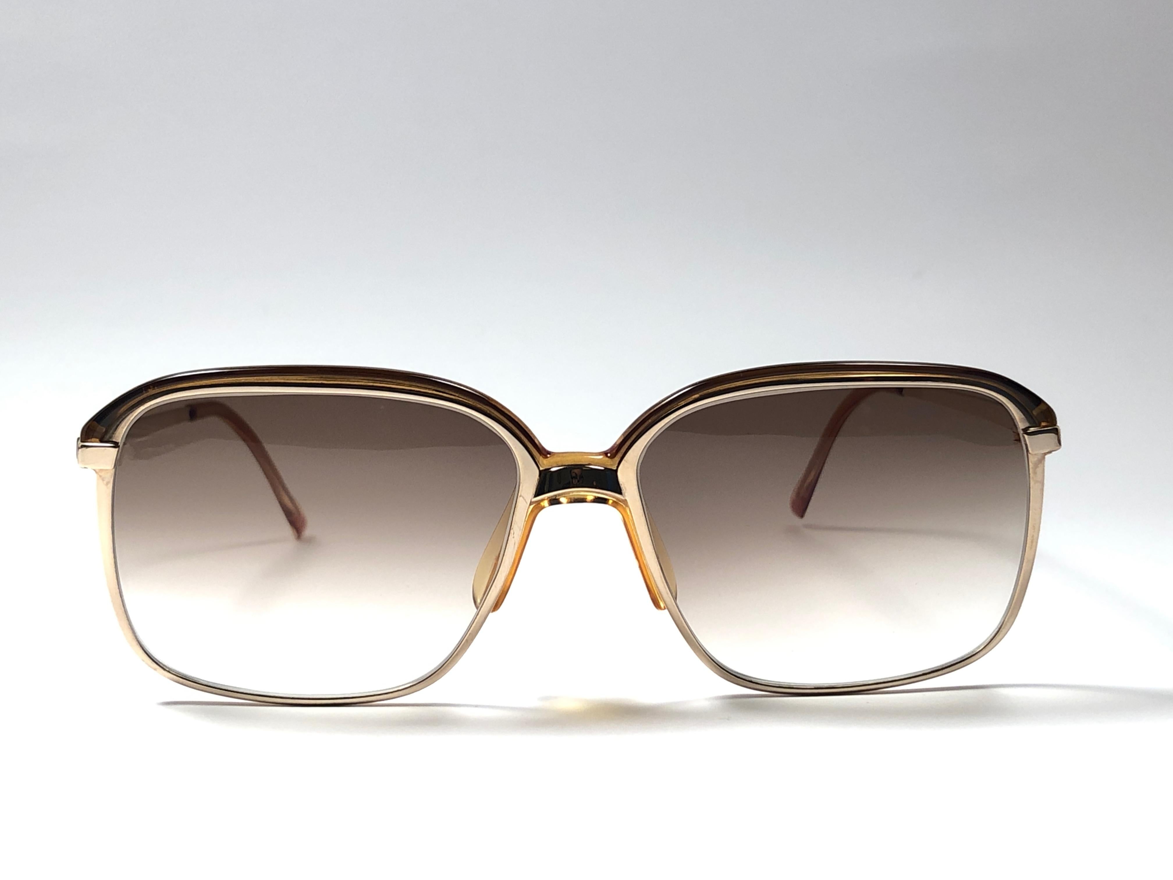 New vintage Christian Dior Monsieur gold & amber details frame.

Spotless brown gradient lenses.

Comes with it original CD Monsieur sleeve.

New, never worn or displayed this item may show light sign of wear due to storage.

Made in Austria