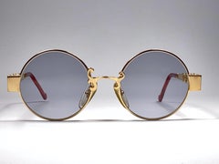 Christian Lacroix - Lunettes de soleil ovales dorées et ambrées, France, 1980, état neuf