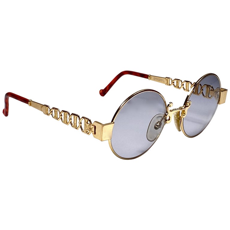 Christian Lacroix Lunettes de soleil ovales dorées et ambrées - Technical View