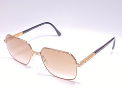 Hellbraune Vintage-Sonnenbrille von Essilor in Gold und Silber, Frankreich, 1970er Jahre
