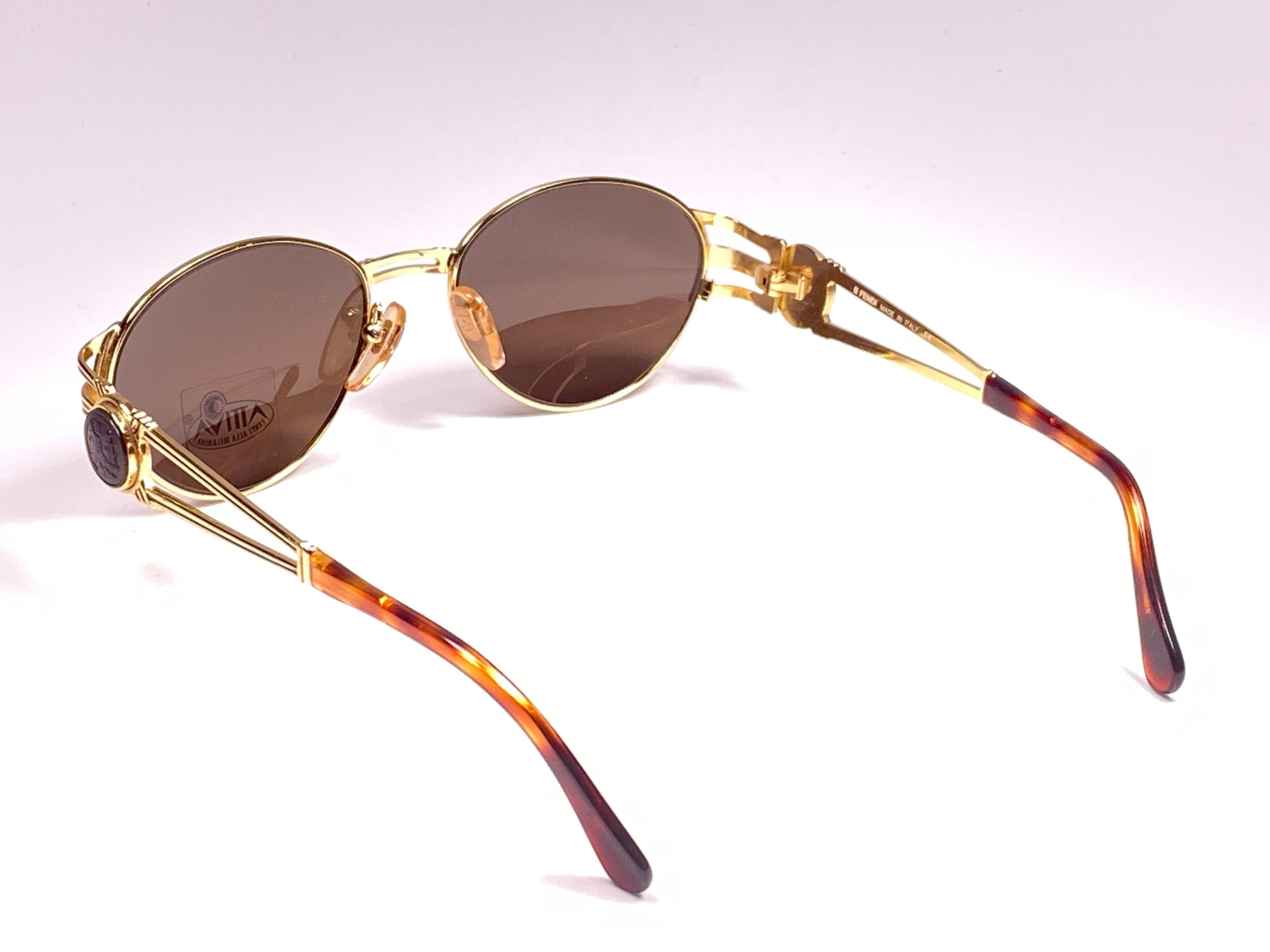 oval tortoise sunglasses