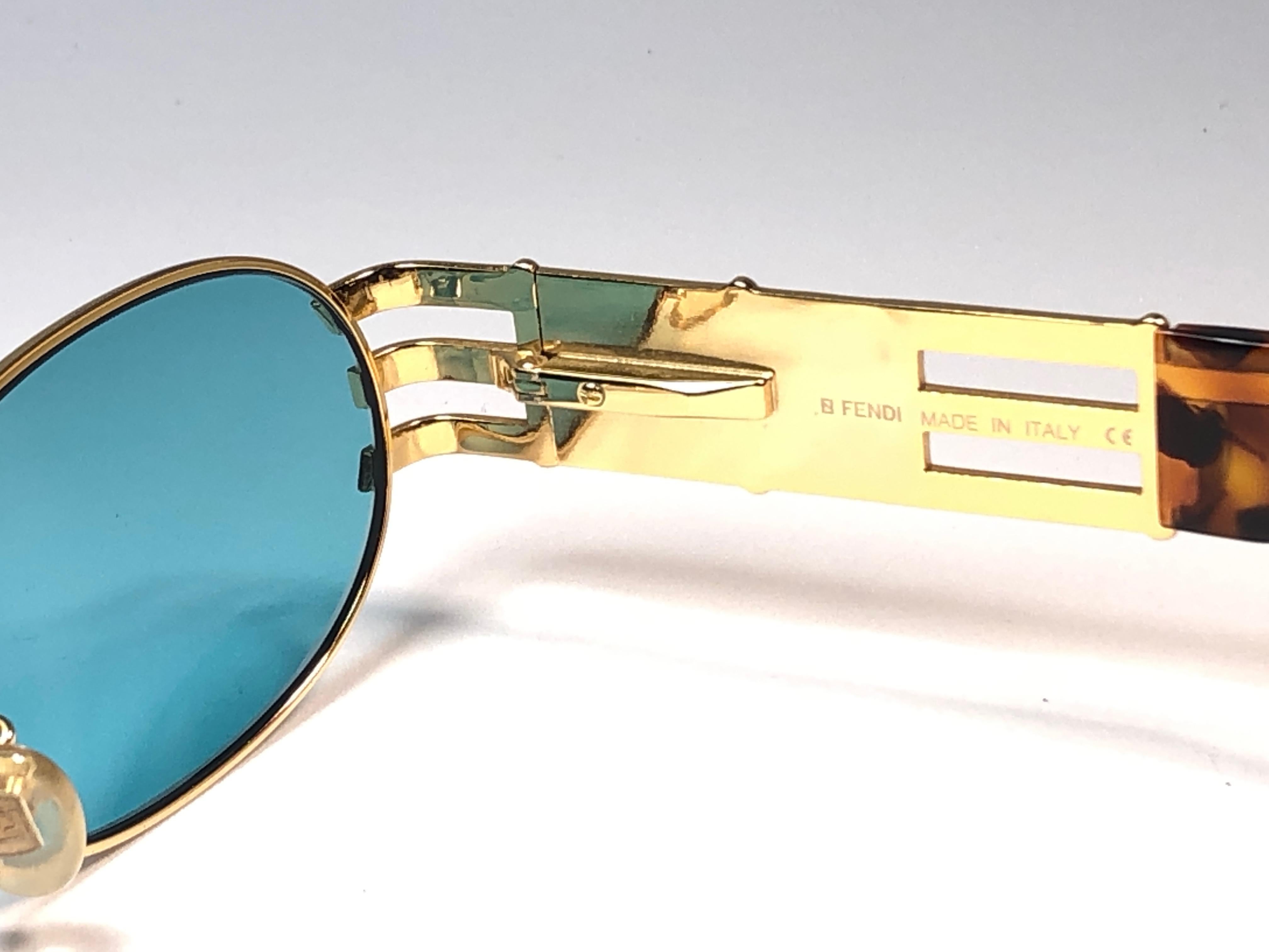 vintage fendi sunglasses gold