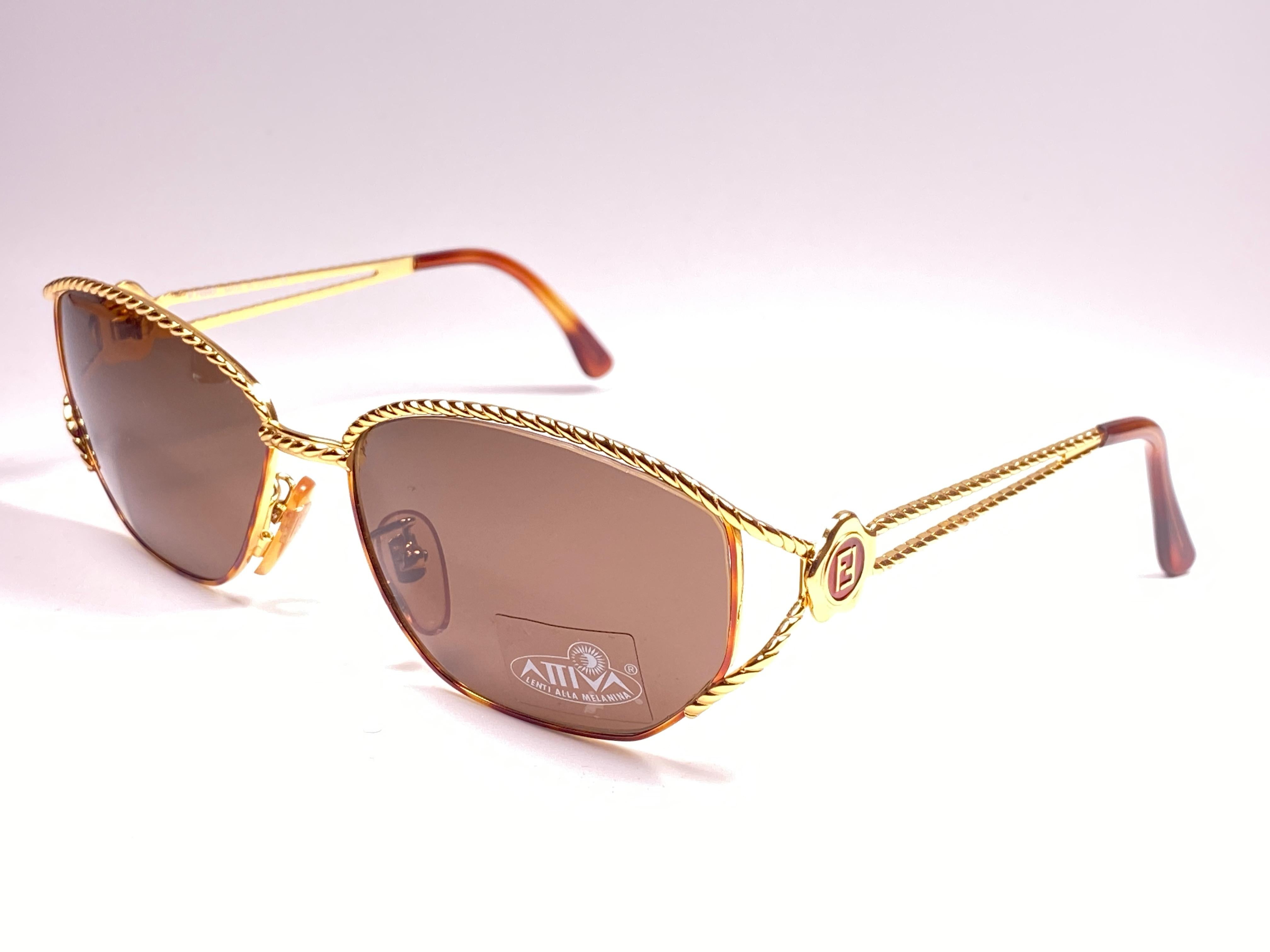 New Vintage Fendi SL7023 Tortoise & Gold Large  1990 Sunglasses Made in Italy In New Condition In Baleares, Baleares